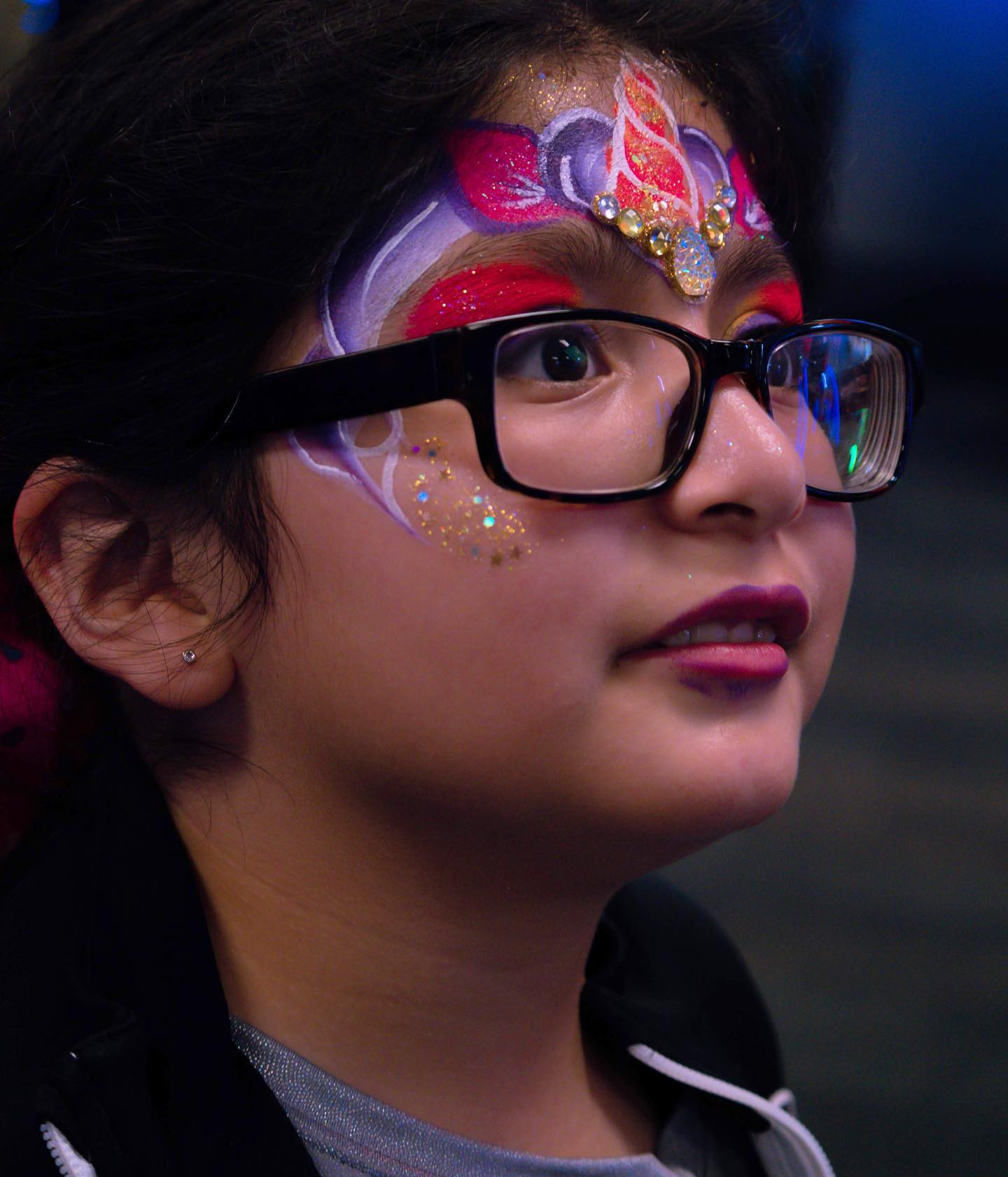 Face painter at work during a Houston family celebration