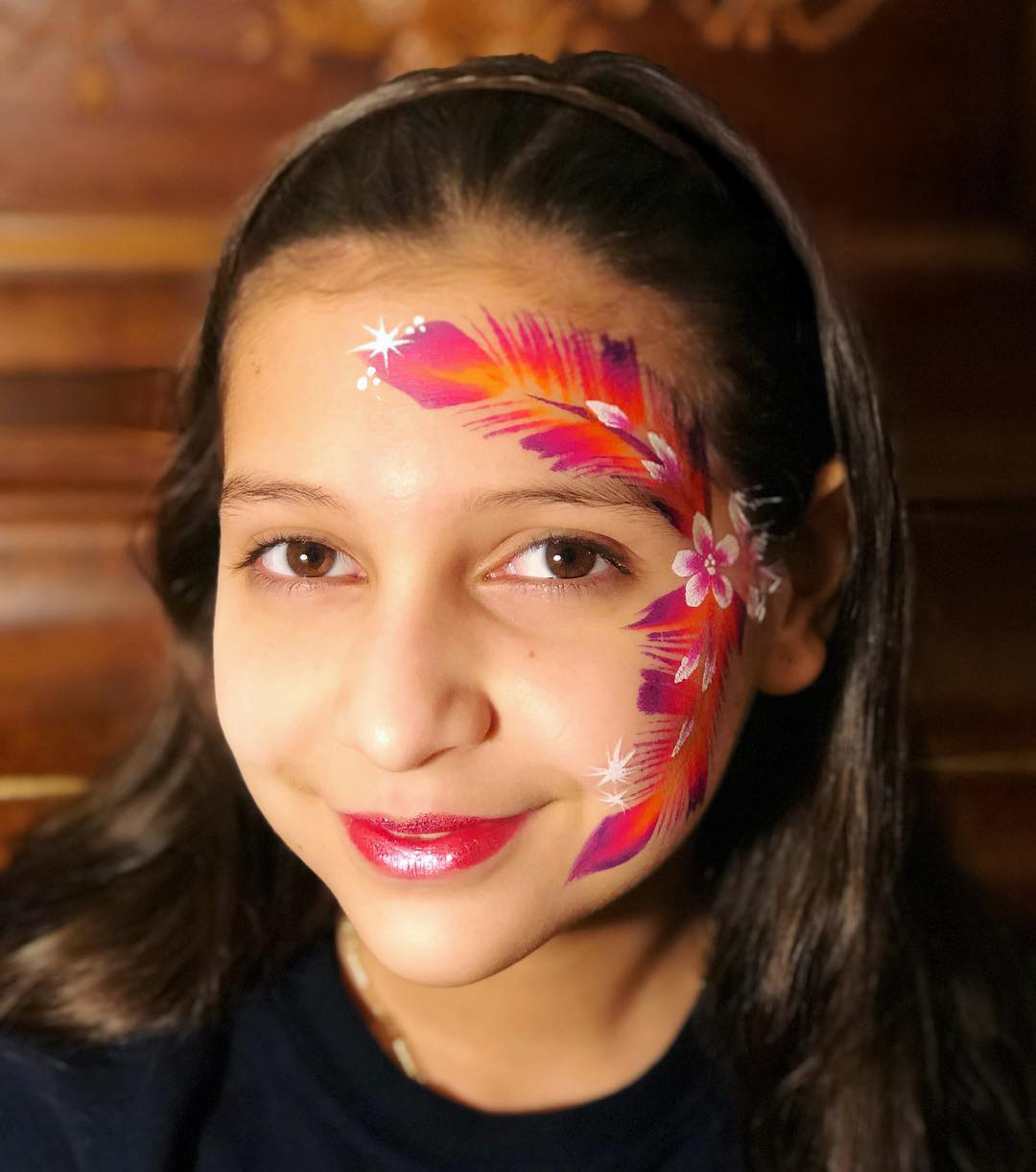 Creative face painting design for a Houston kids party
