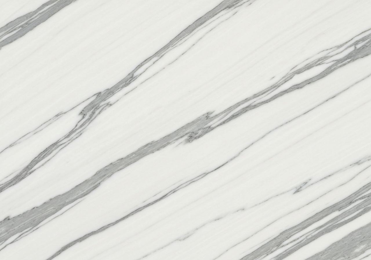Calacatta marble slab with dramatic gold and gray veining — luxury countertop option in Utah