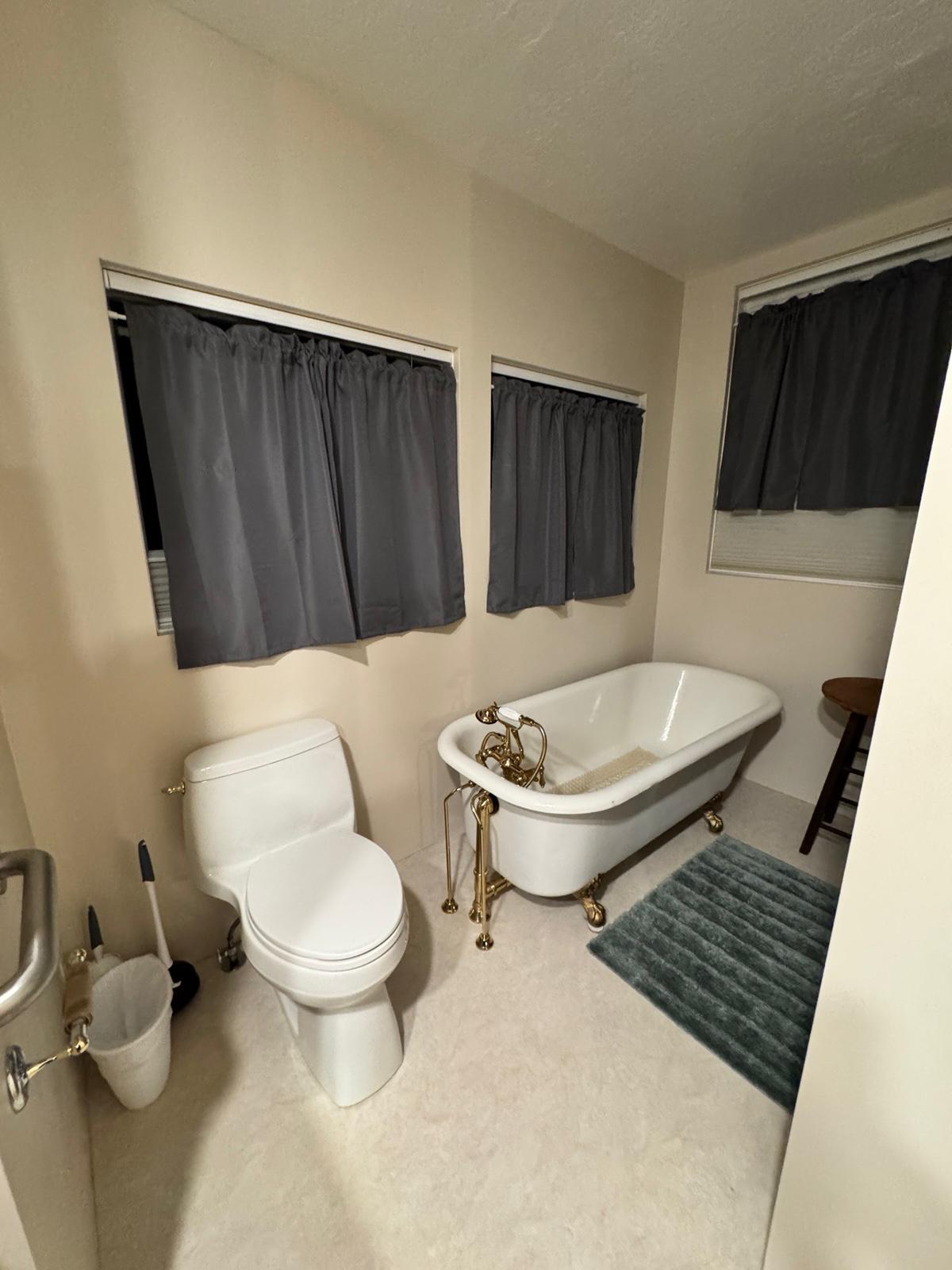 Freestanding clawfoot tub in a Utah bathroom remodel
