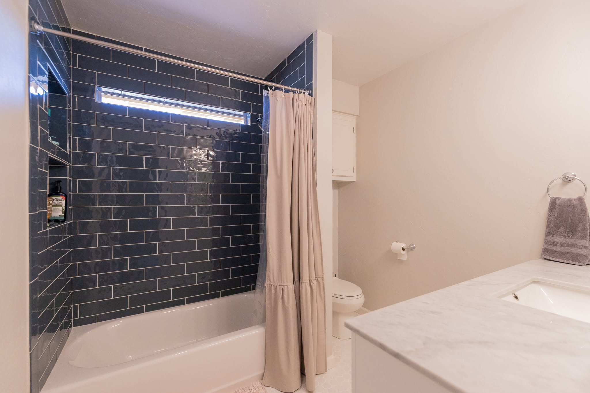 Modern Navy Subway Tile Shower & Bath Retreat