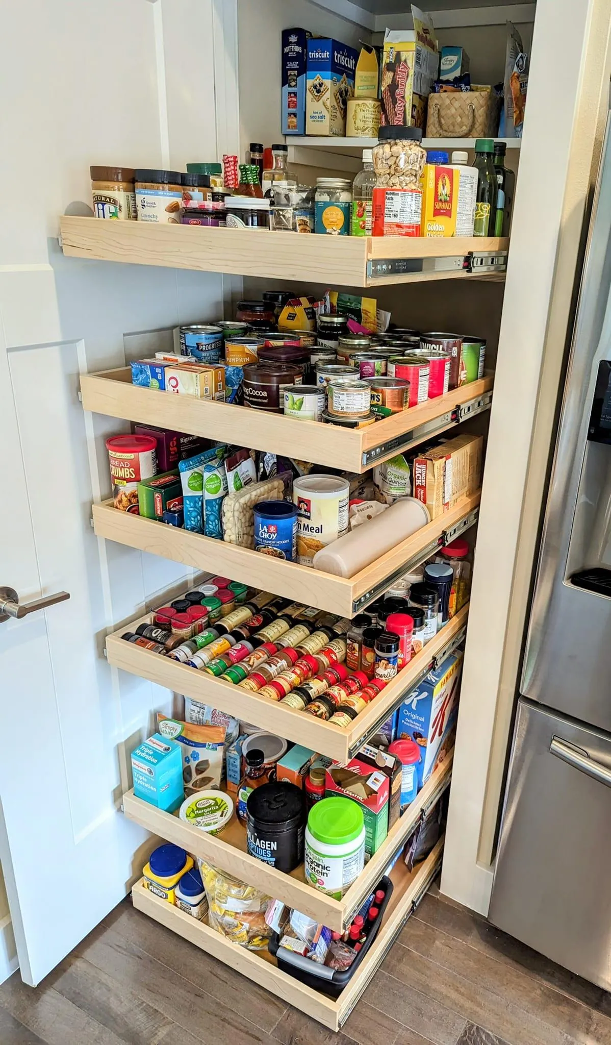 Pantry Glide-Out Shelves - No more messy, hard-to-reach corners. Our pantry pullouts bring everything to you.