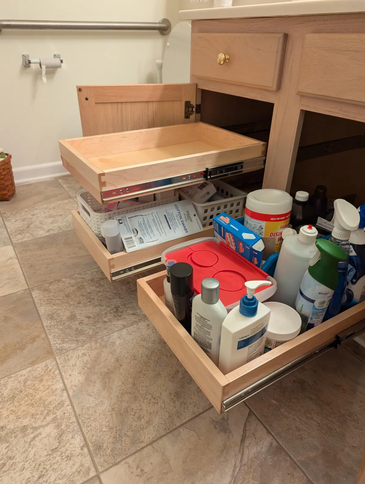 Bathroom Cabinet Pull-Outs - Create a calm and clutter-free bathroom with custom slide-out drawers for toiletries, cleaning products, and towels.