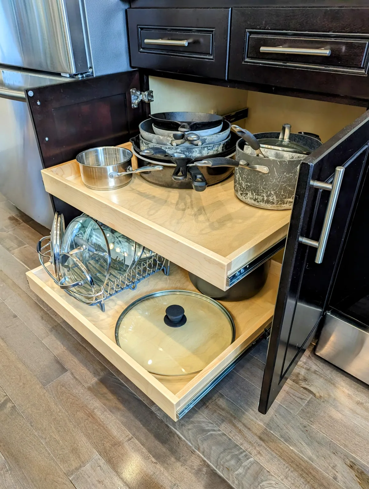Beautifully organized cabinet with custom glide-outs