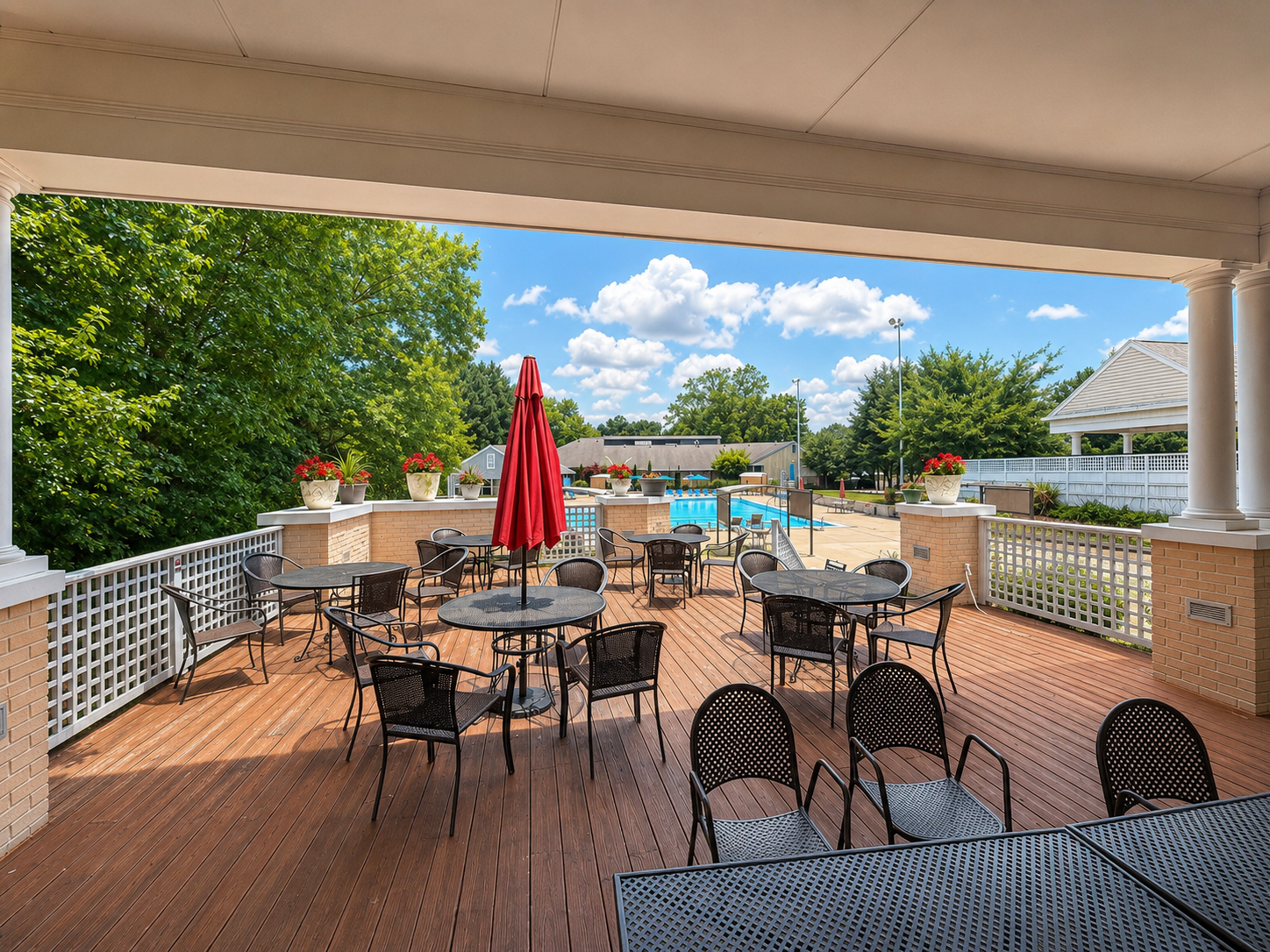 Fusion patio with pool view and outdoor seating at Ridgefields