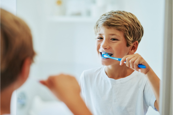 Child brushing teeth