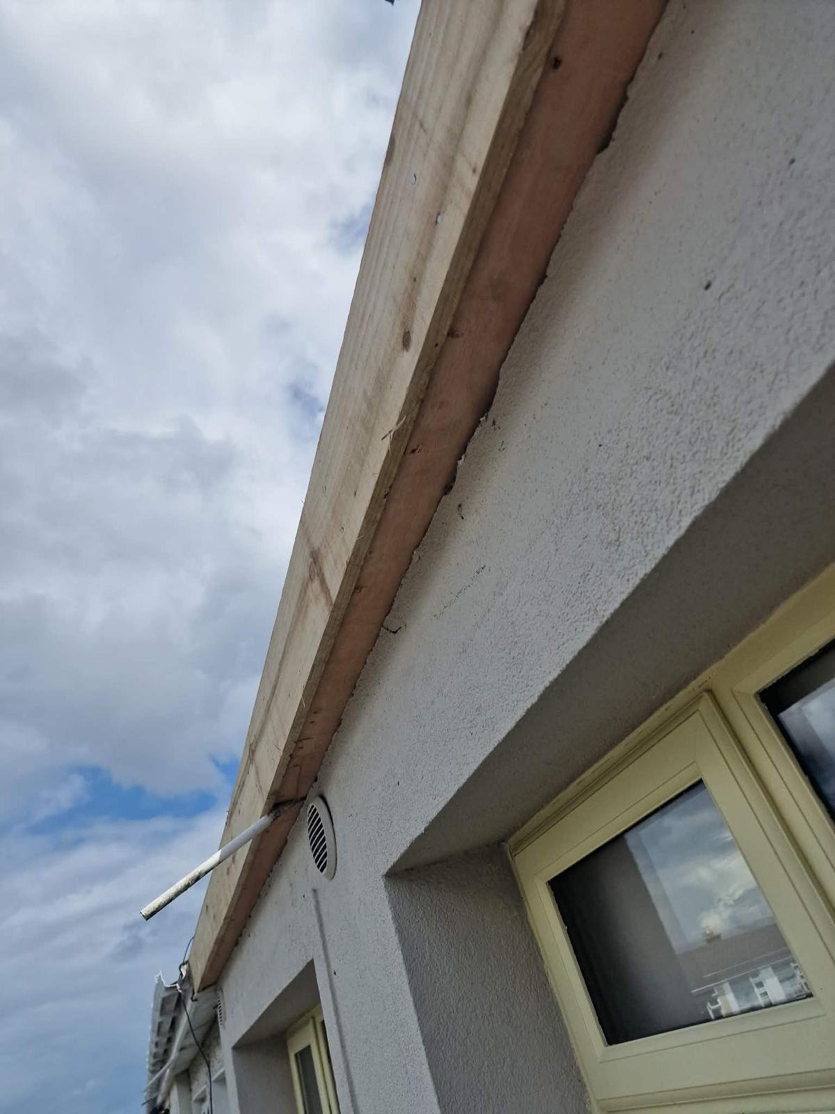 New timber fascia board fitted along the eaves of a home in Tallaght, Dublin 24, seen from below