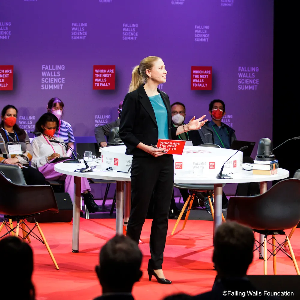 Dr. Melanie Windridge speaking at an event