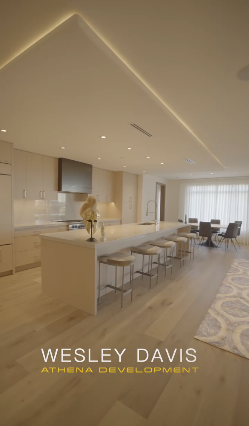 Luxury custom kitchen featuring Athena-inspired gold helmet artifact