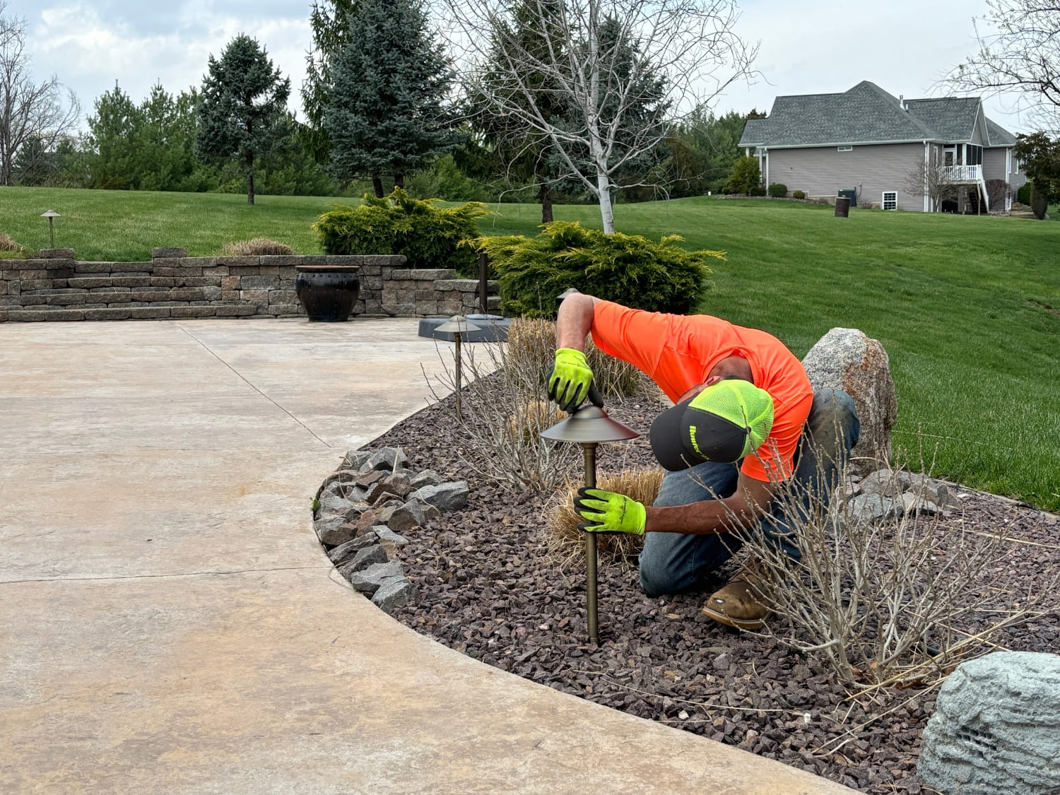 Bergman Nurseries professional installing landscape lighting