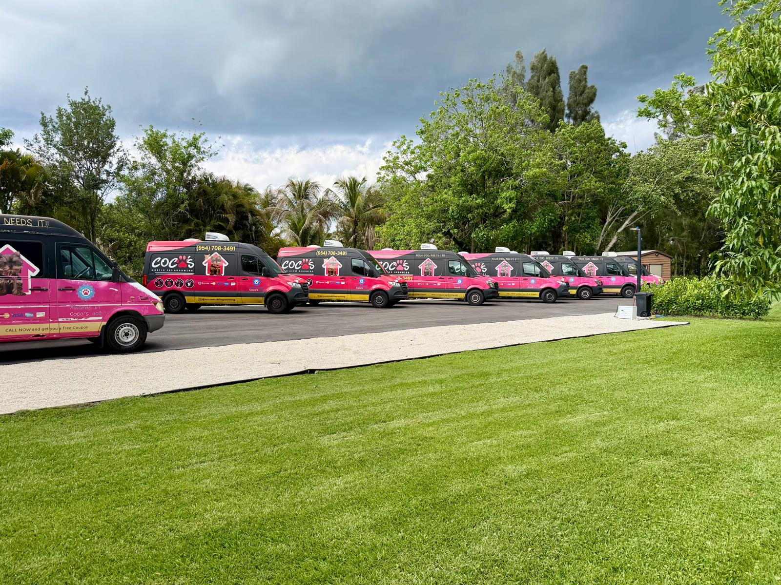 Coco's branded mobile grooming fleet