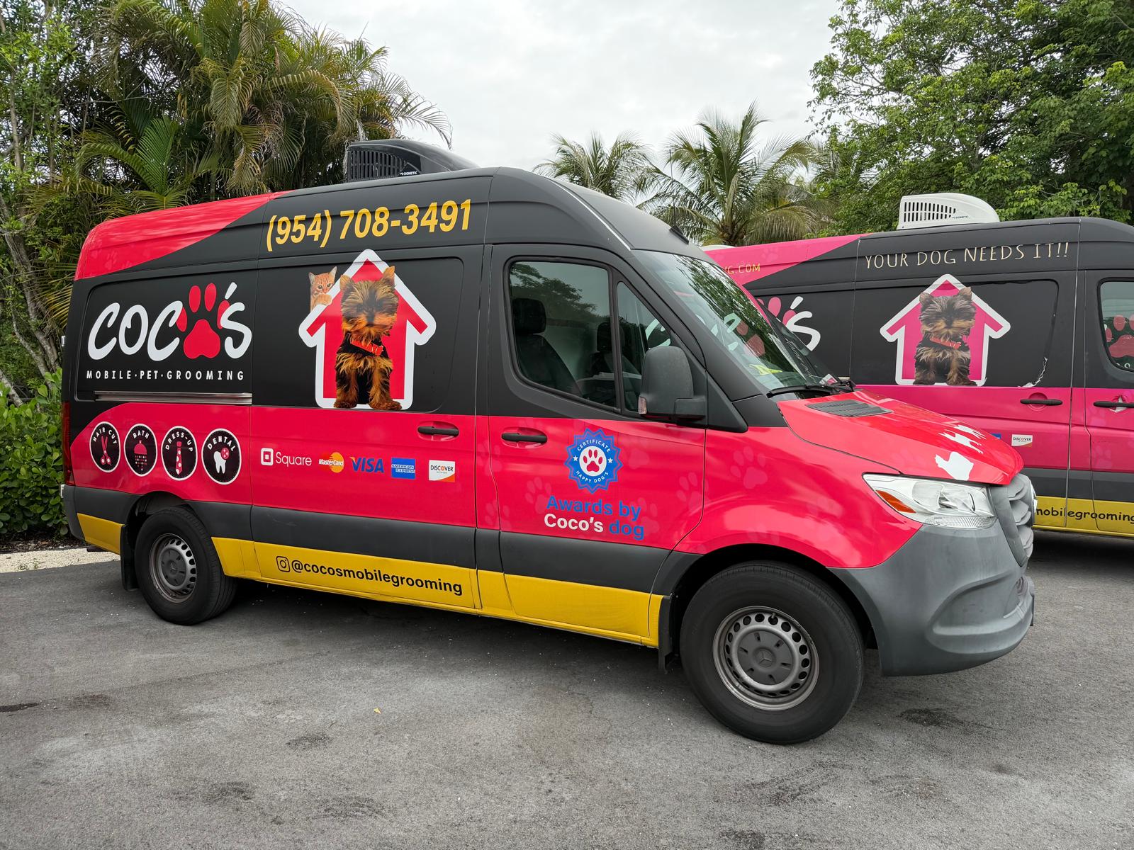 Coco's branded mobile grooming van parked outside a home