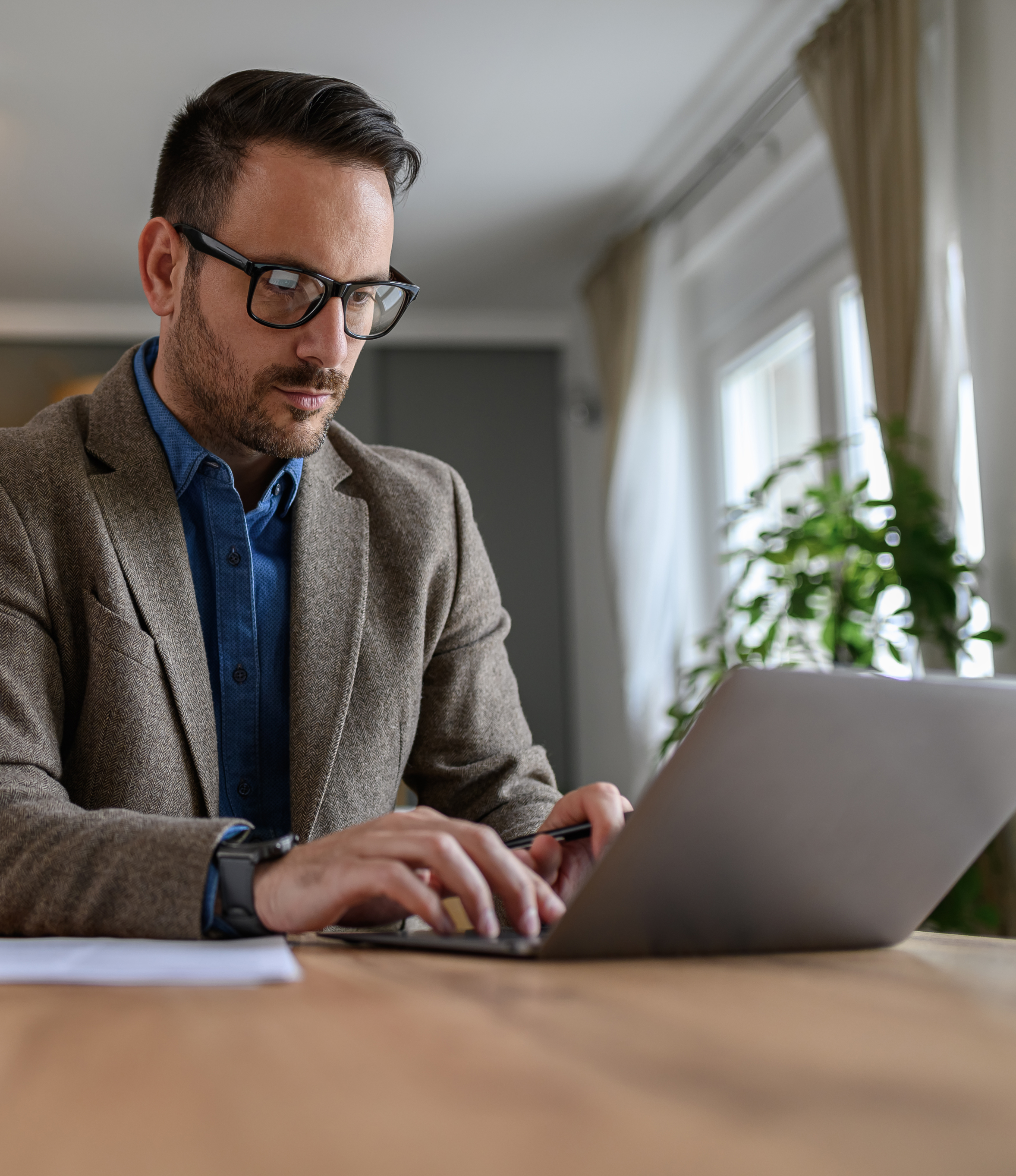 Startup founder using a laptop