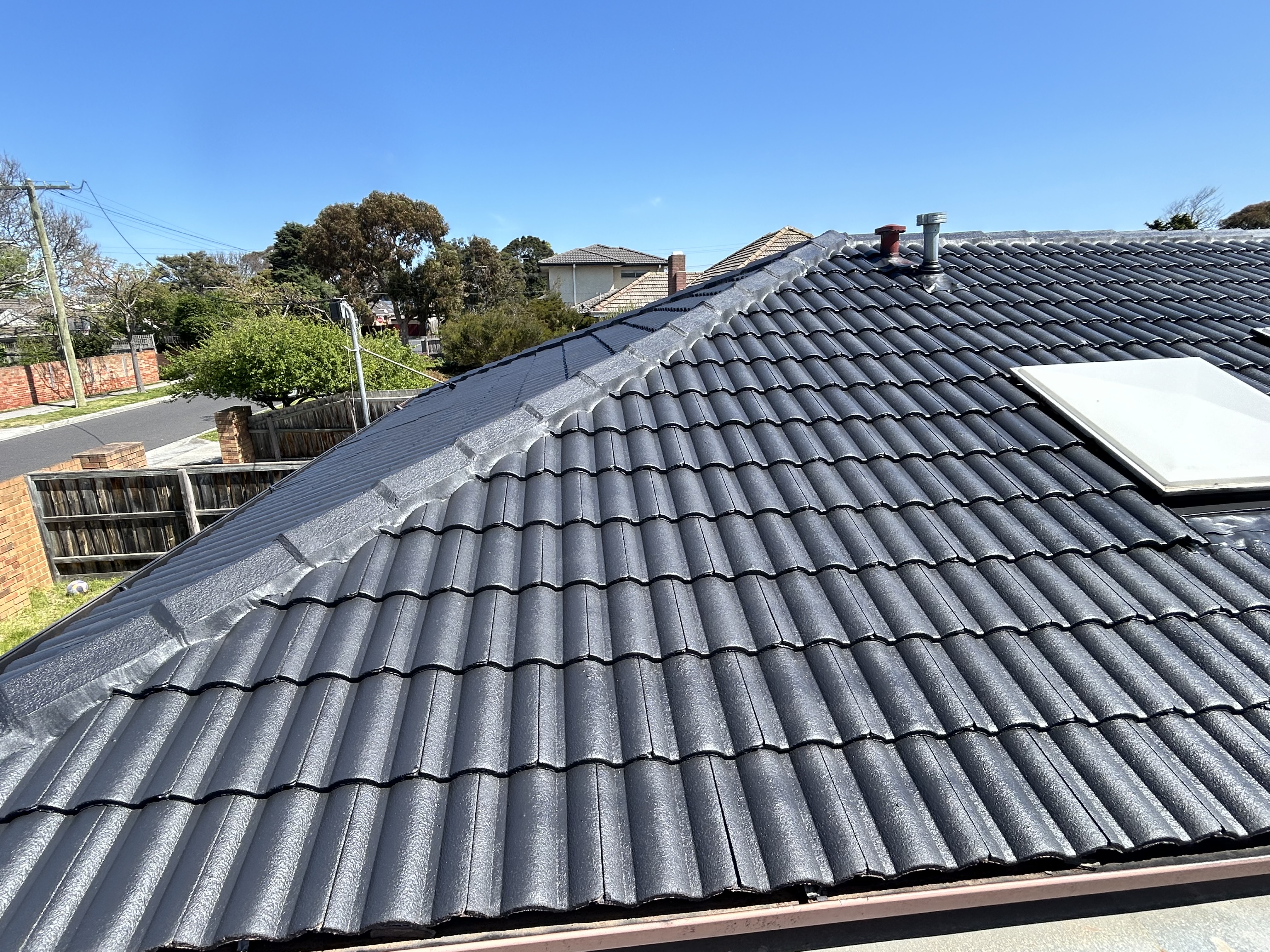 Master restored tile roof by Chris