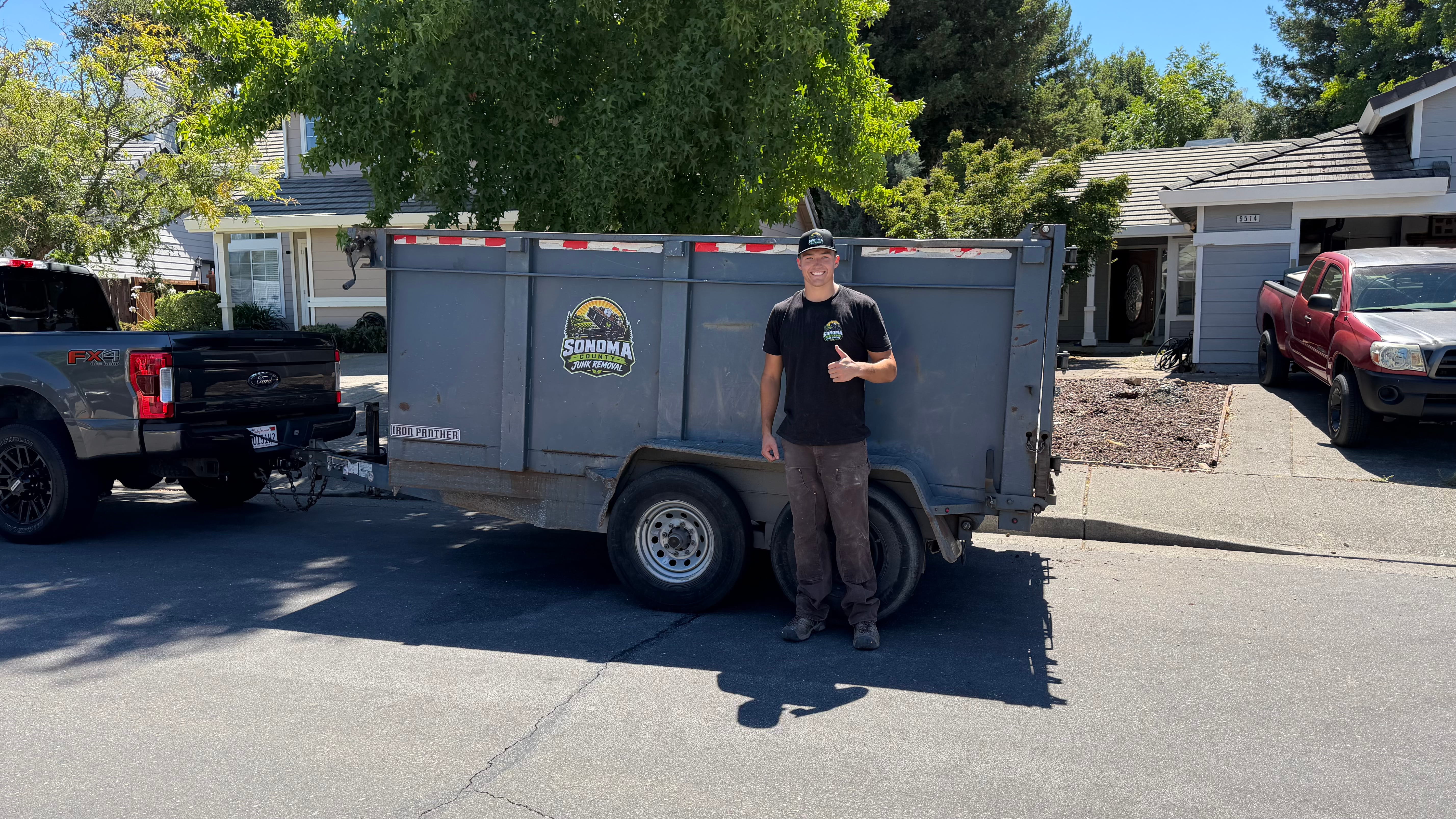 Conner - Owner of Sonoma County Junk Removal standing by truck