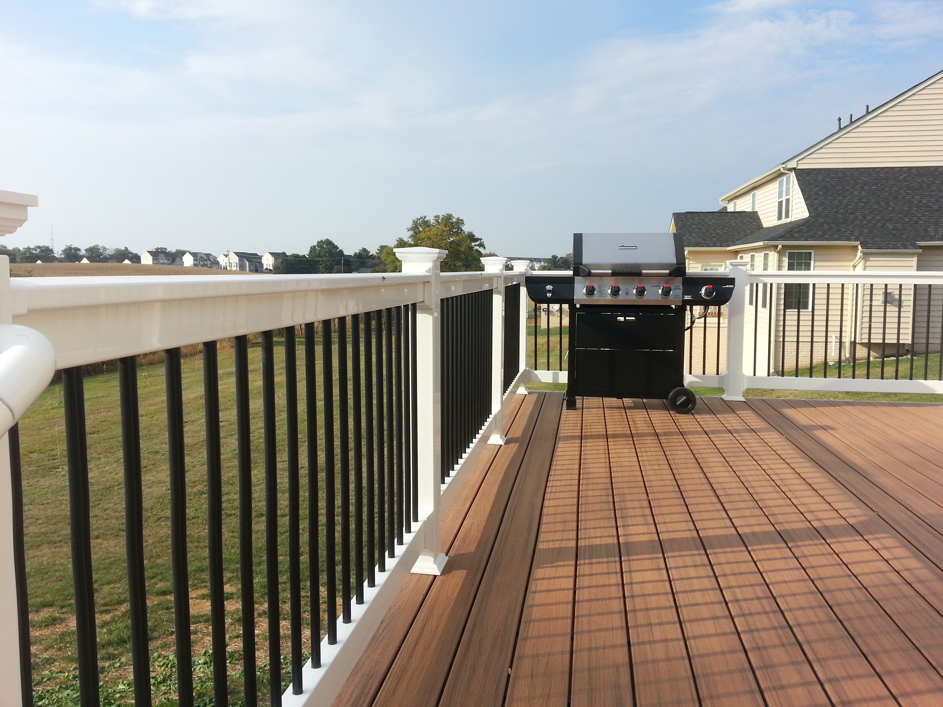 Composite deck with grill