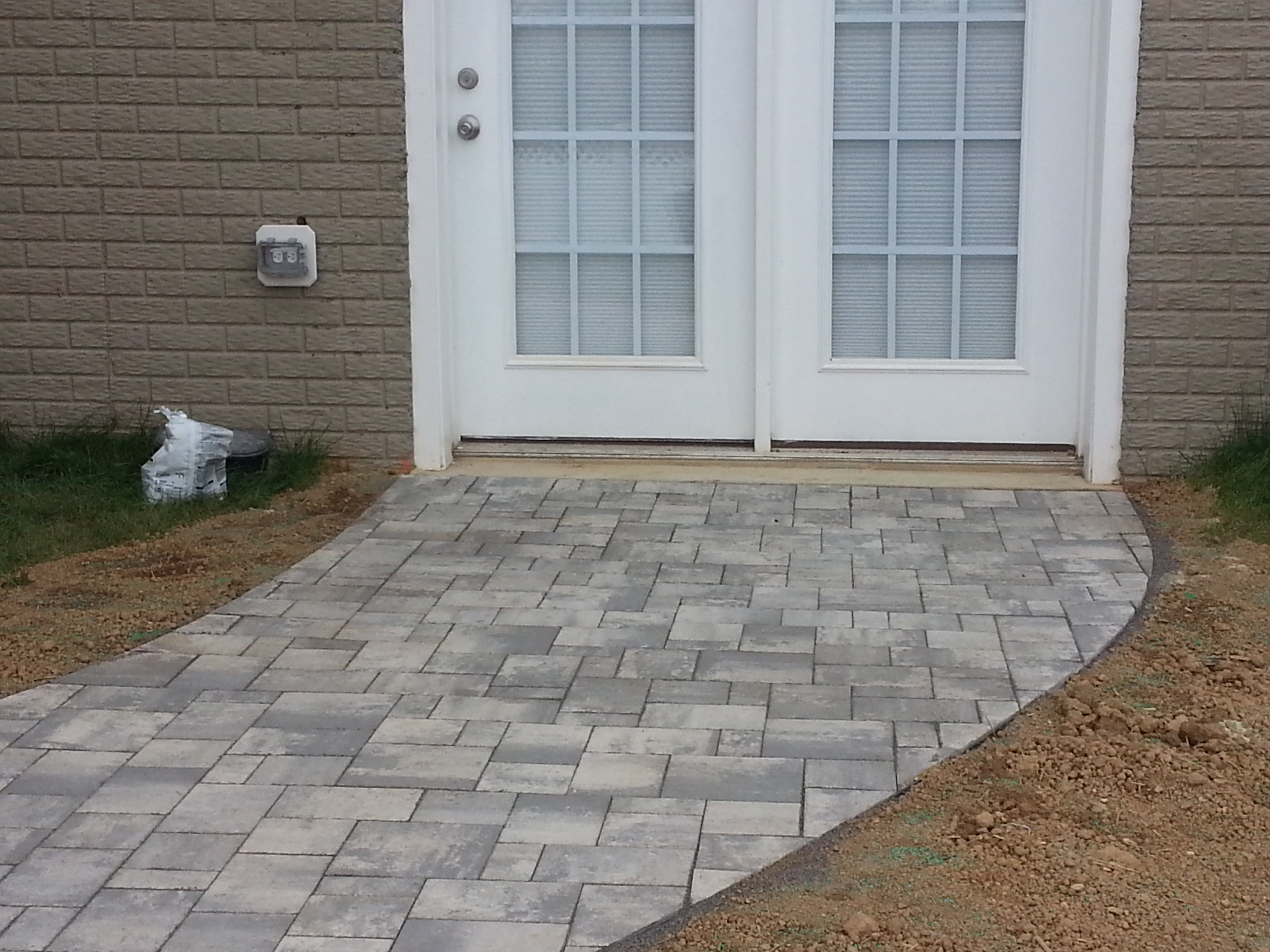 Paver walkway to double doors