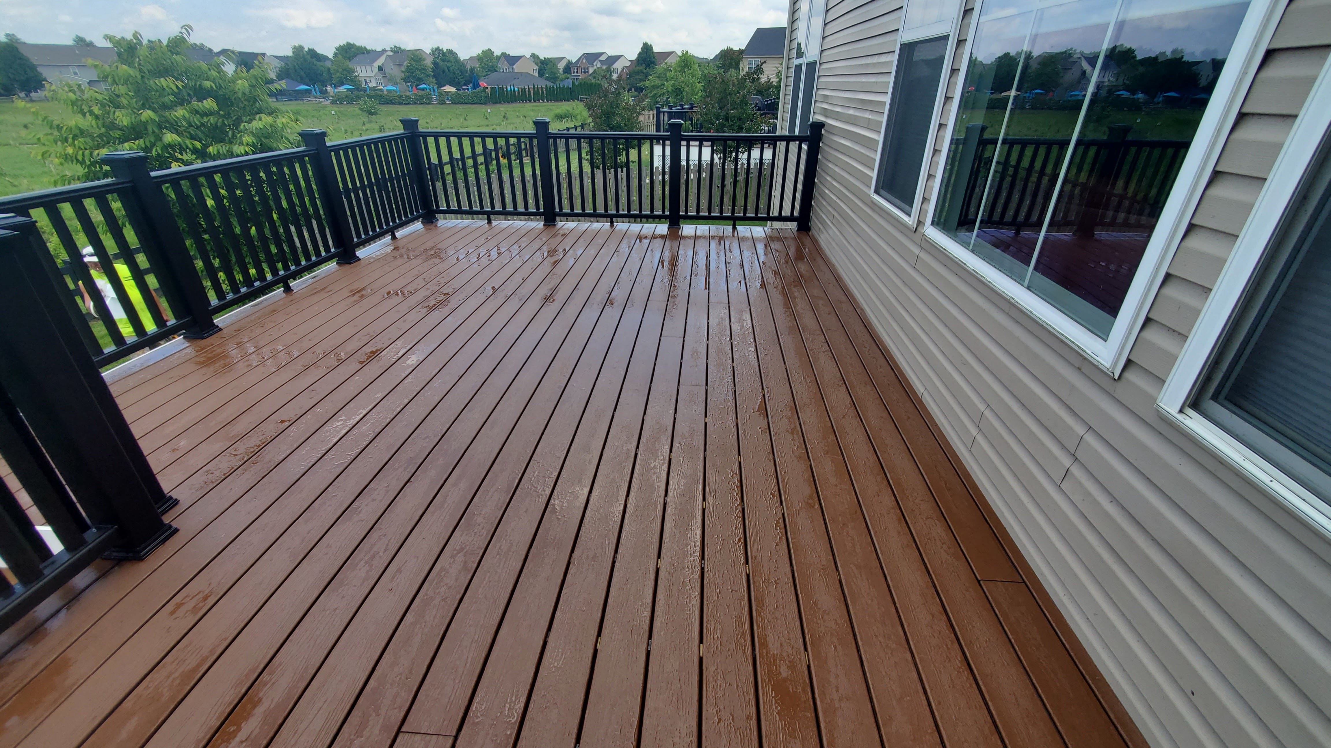 Brown composite deck with black railings