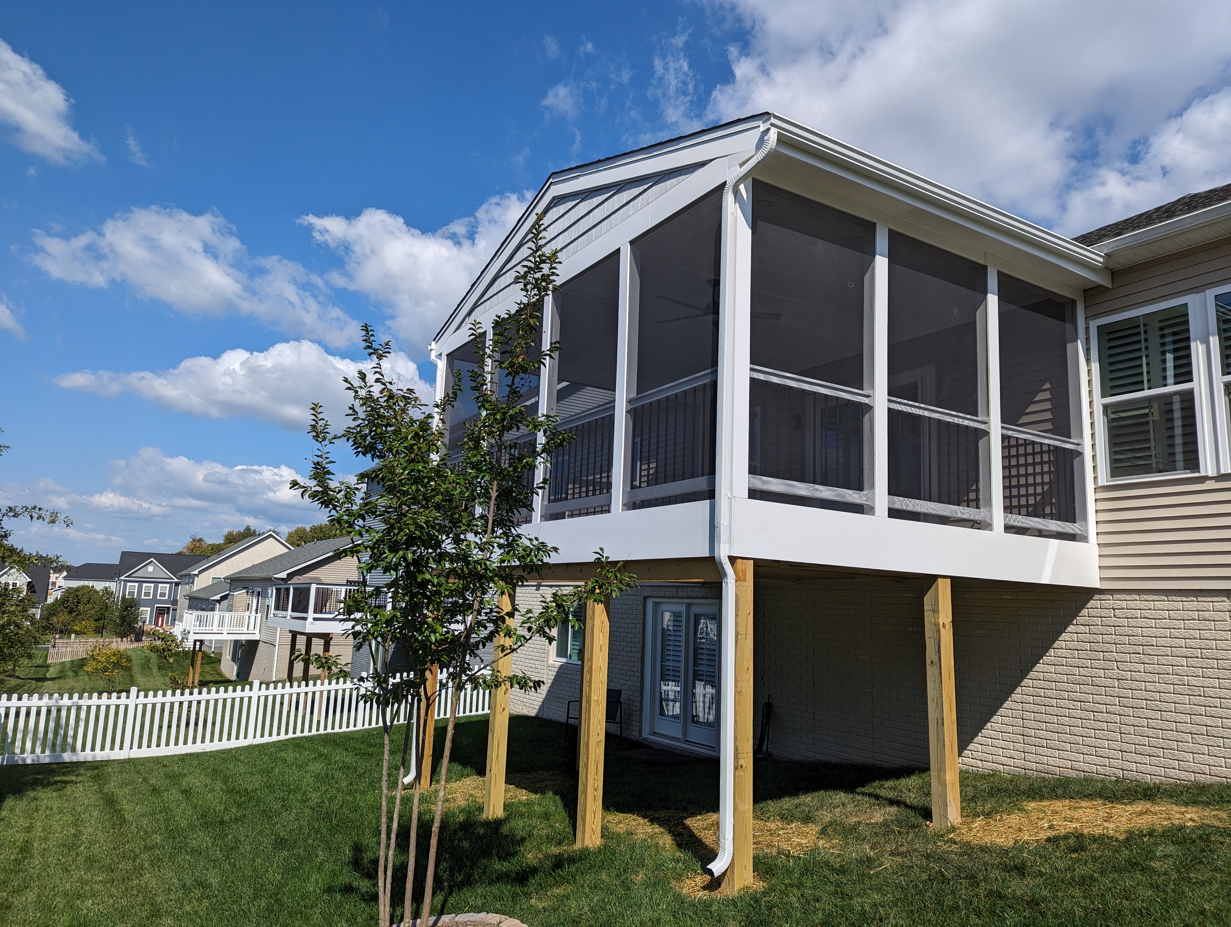 Elevated screened porch exterior
