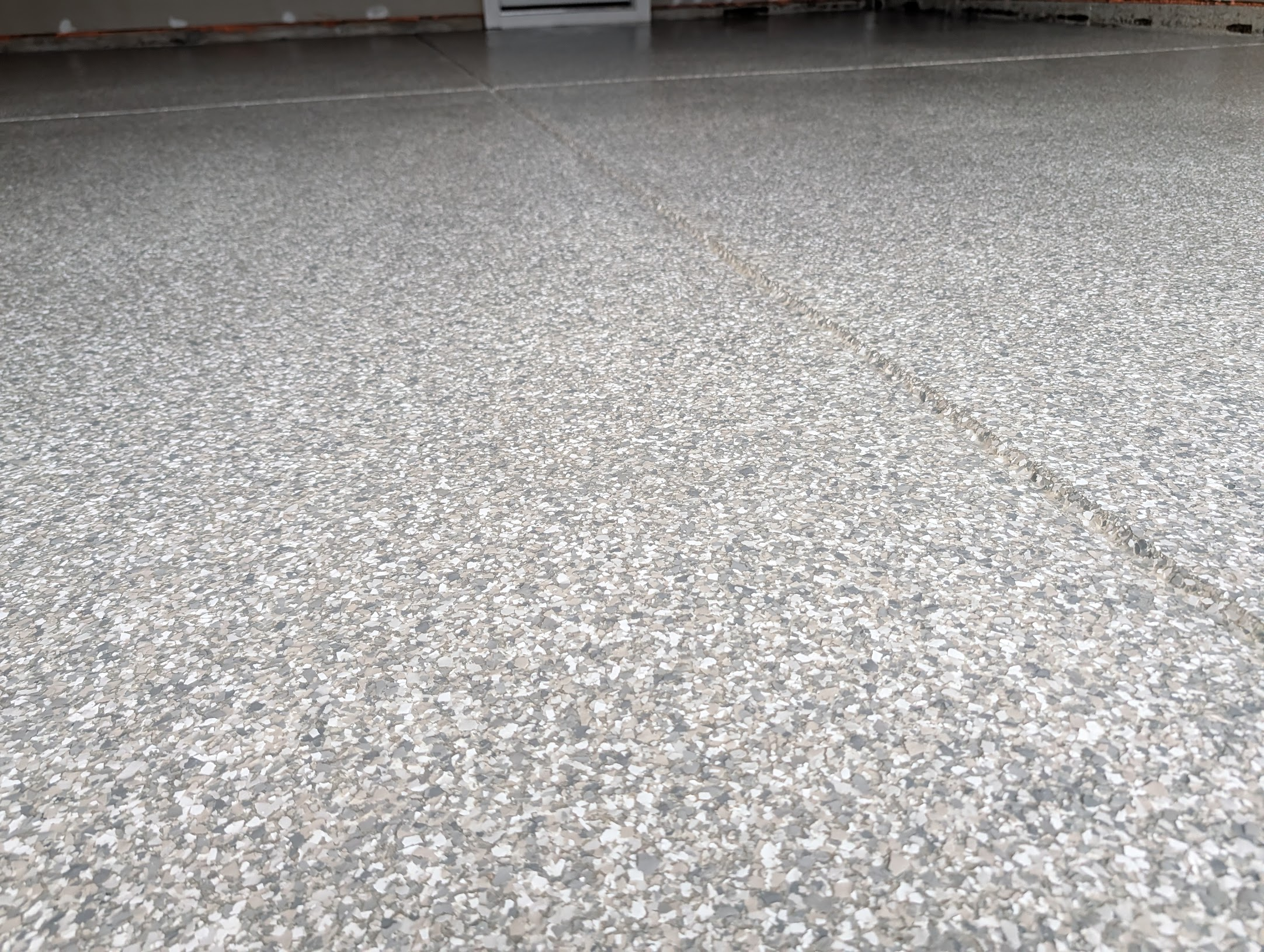 Top Dog Coatings epoxy flake flooring project