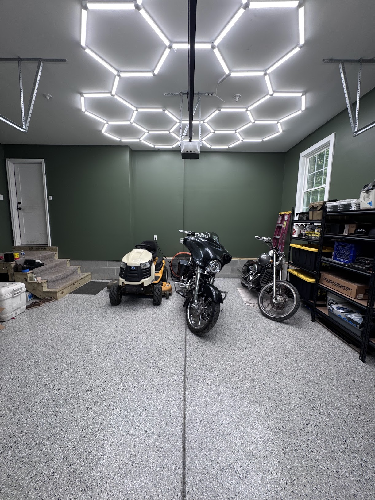 Garage epoxy flake floor with custom hexagon lighting