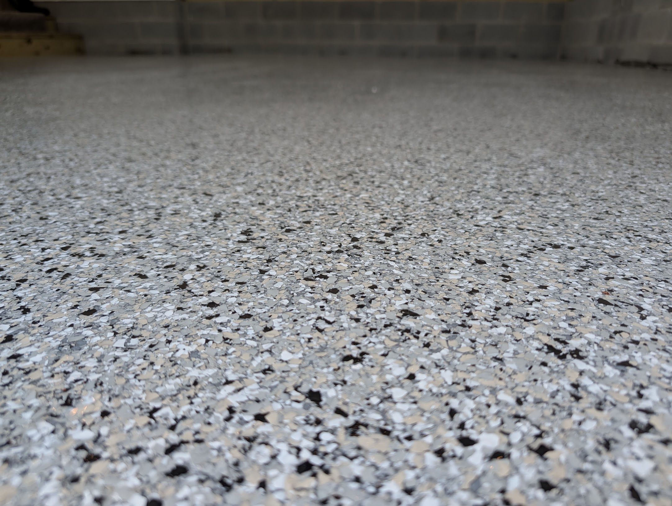 Close-up detail of textured epoxy flake finish