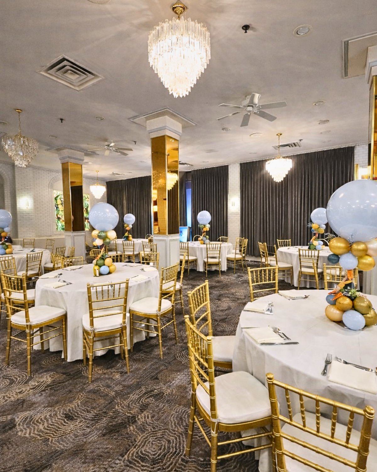 Elegant white and gold balloon arch for baby shower