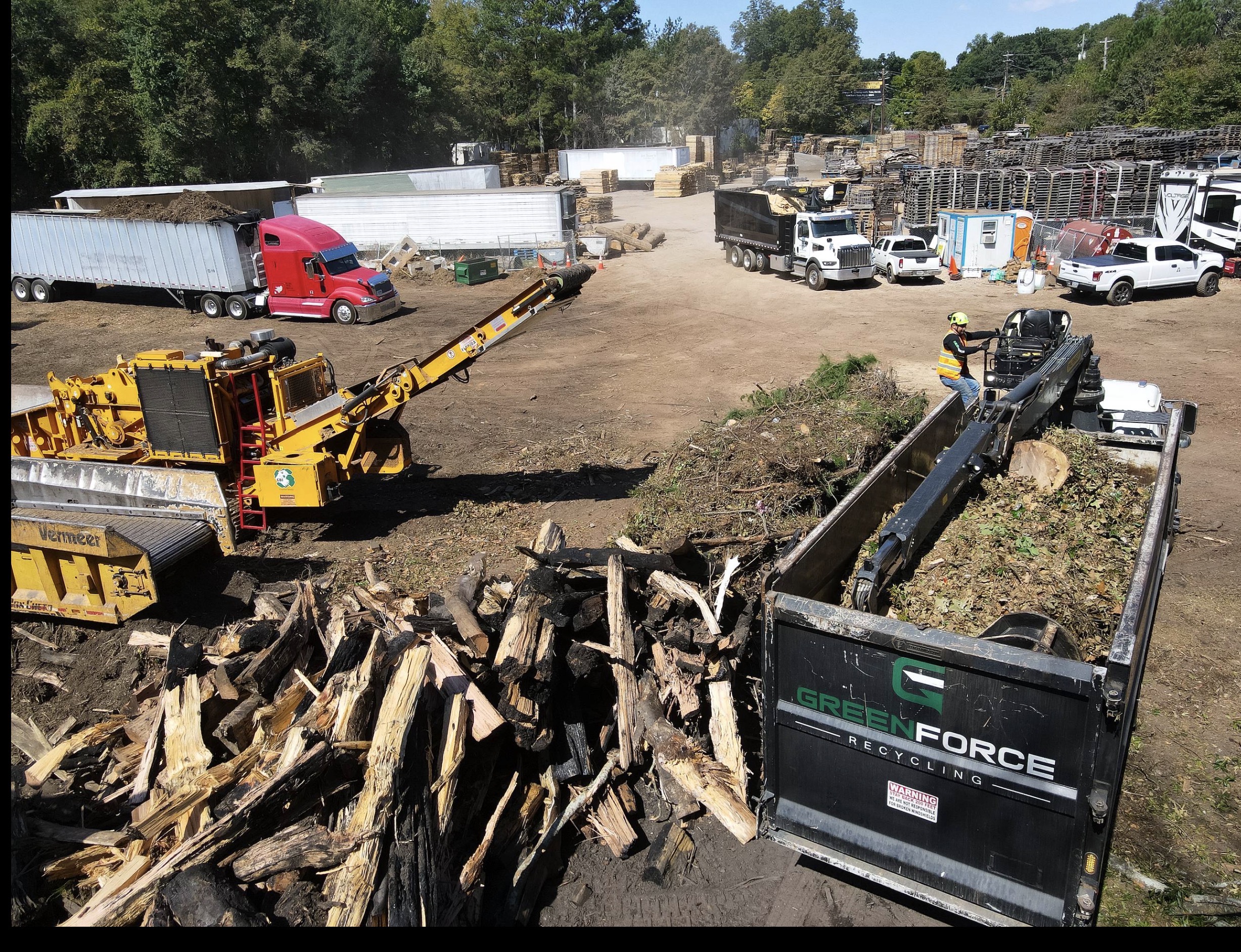 GreenForce Recycling yard with Vermeer equipment, grapple truck and tree debris operations in Georgia