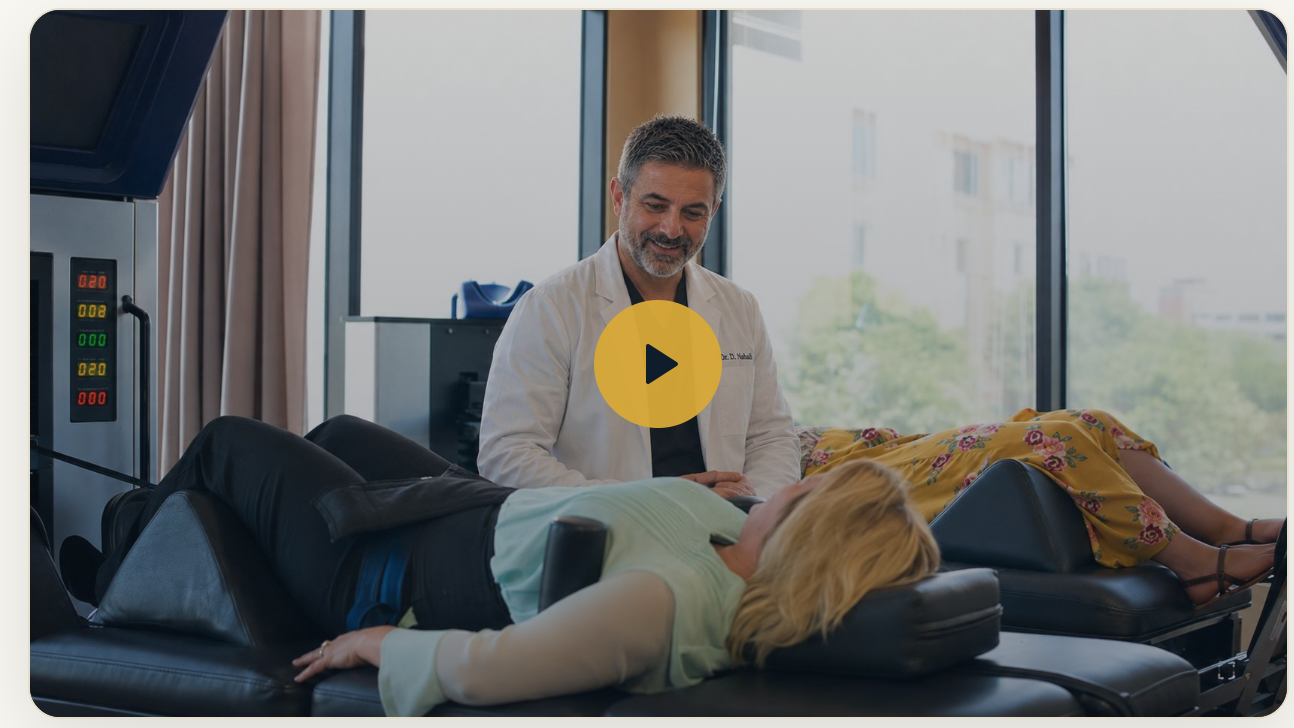 Dr. David Nahali with patient on DRX9000 decompression table