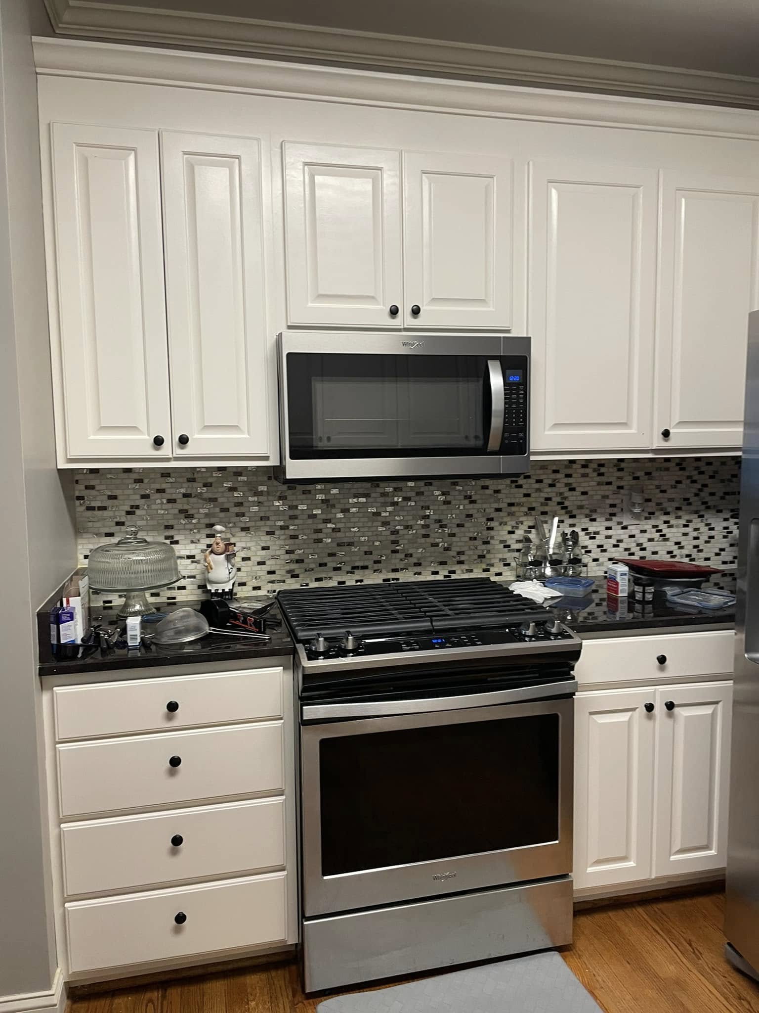 White kitchen cabinets oven view
