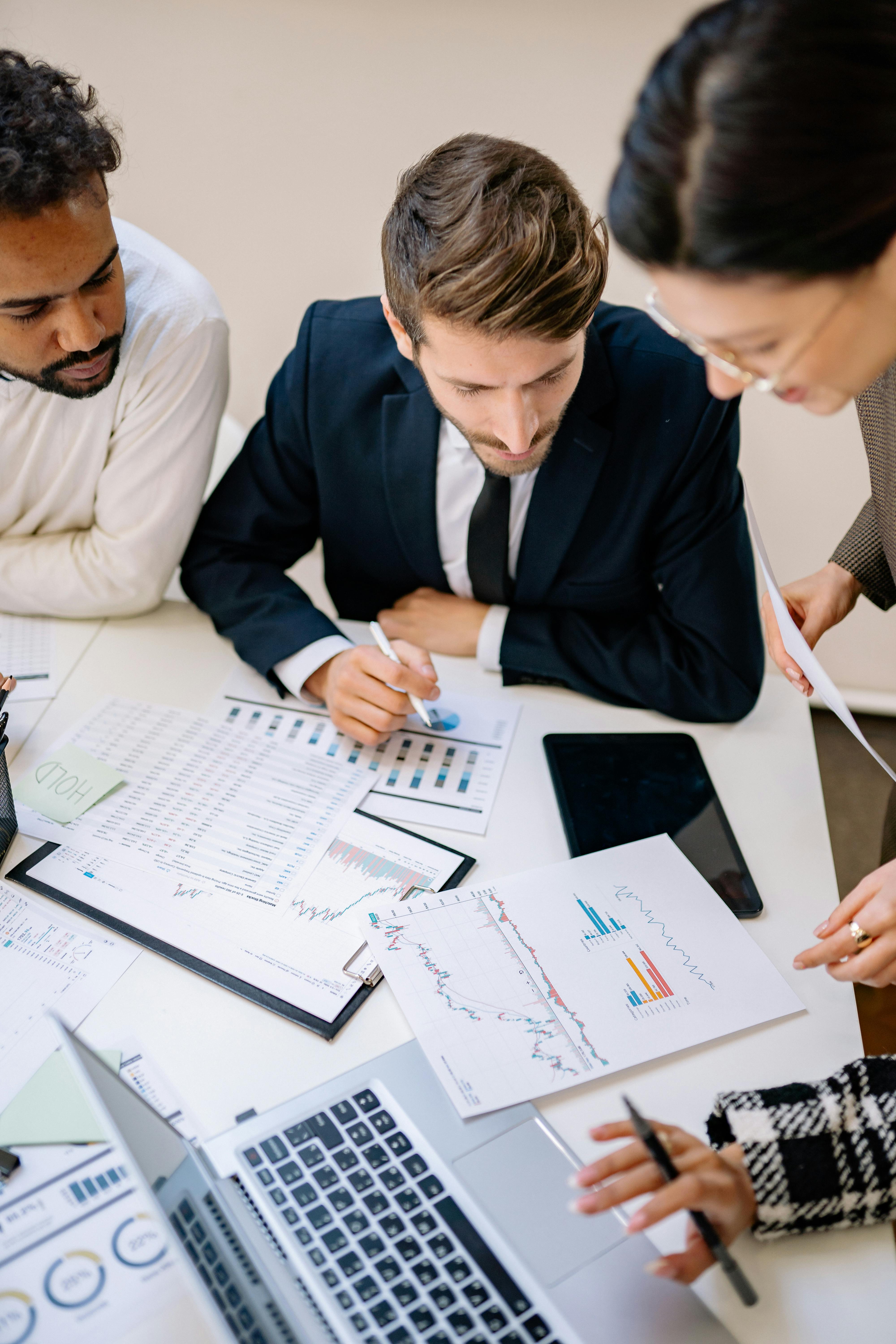 Financial professional reviewing investor documents
