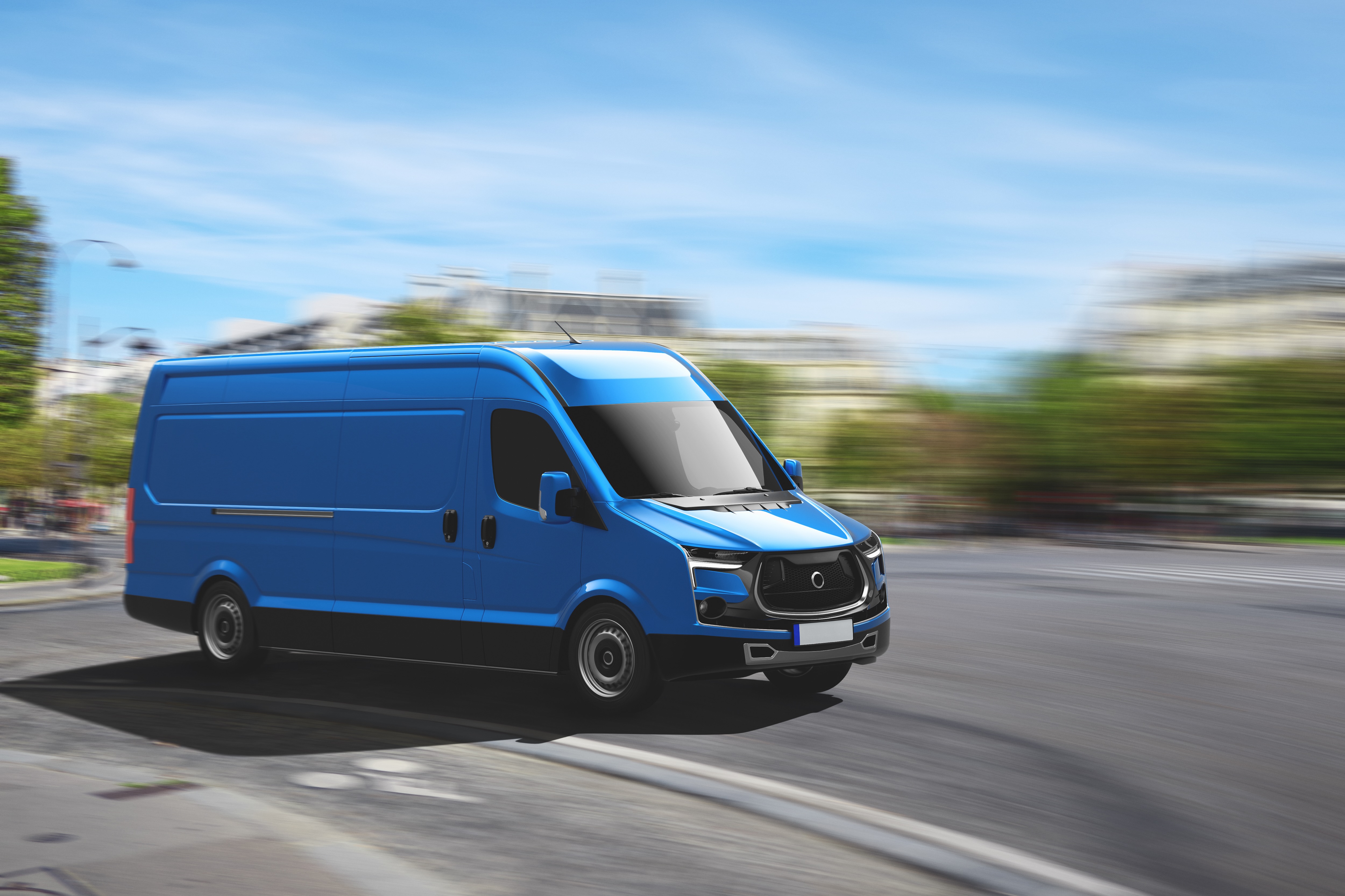 Blue used commercial van on the road