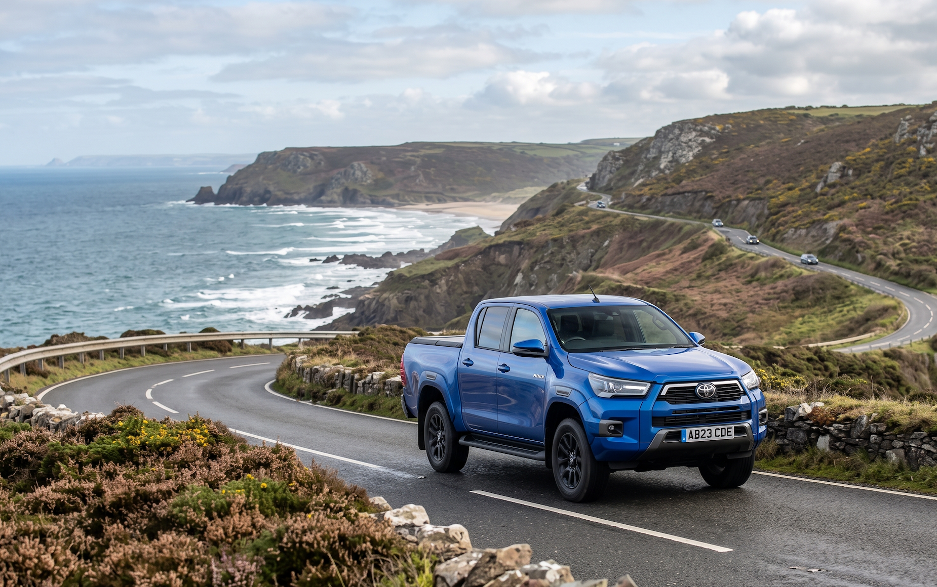 Toyota Hilux pickup truck on a rural road