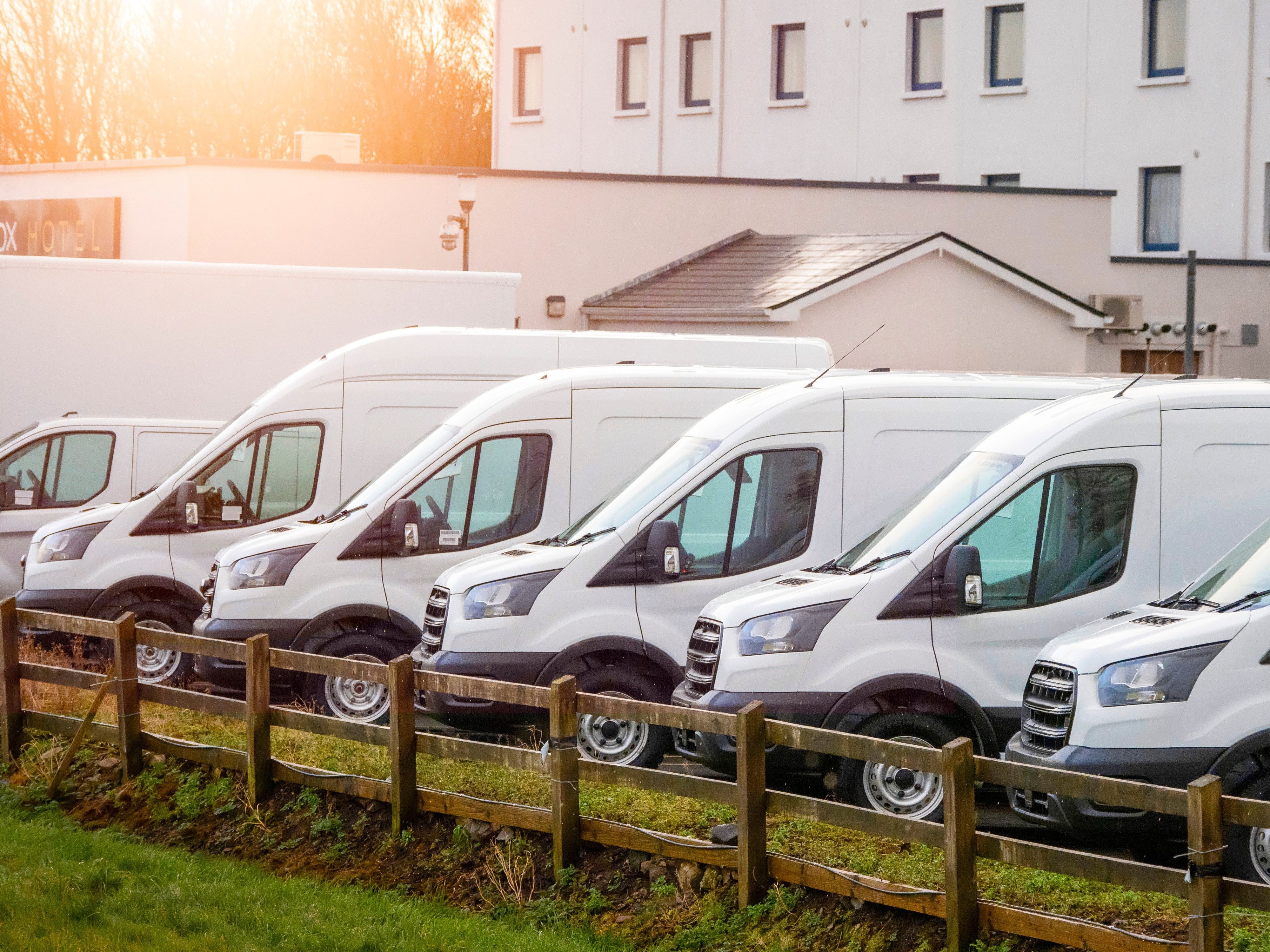 Well-presented used white panel van on an independent dealer forecourt