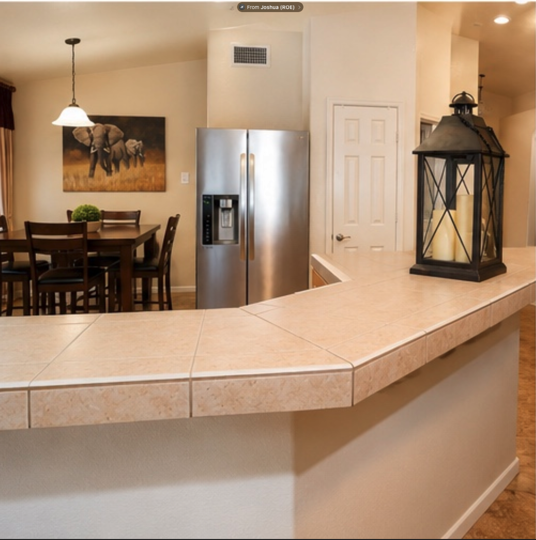 Kitchen and dining area at 7642 Plunging Falls Drive