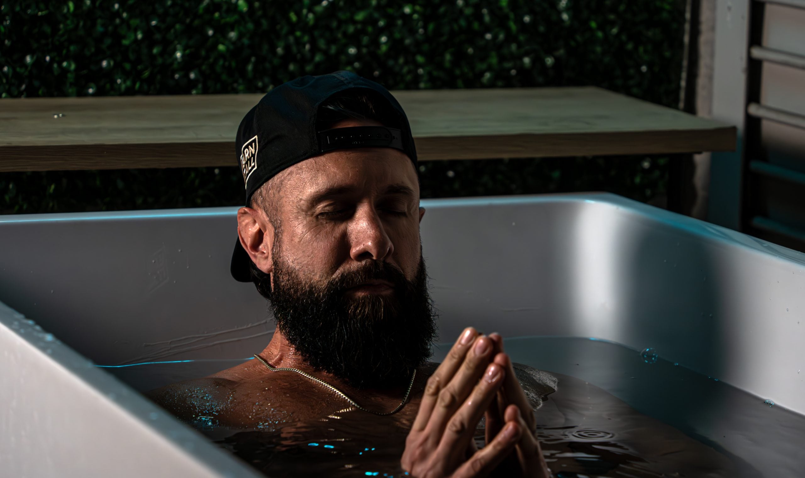 Man in cold plunge