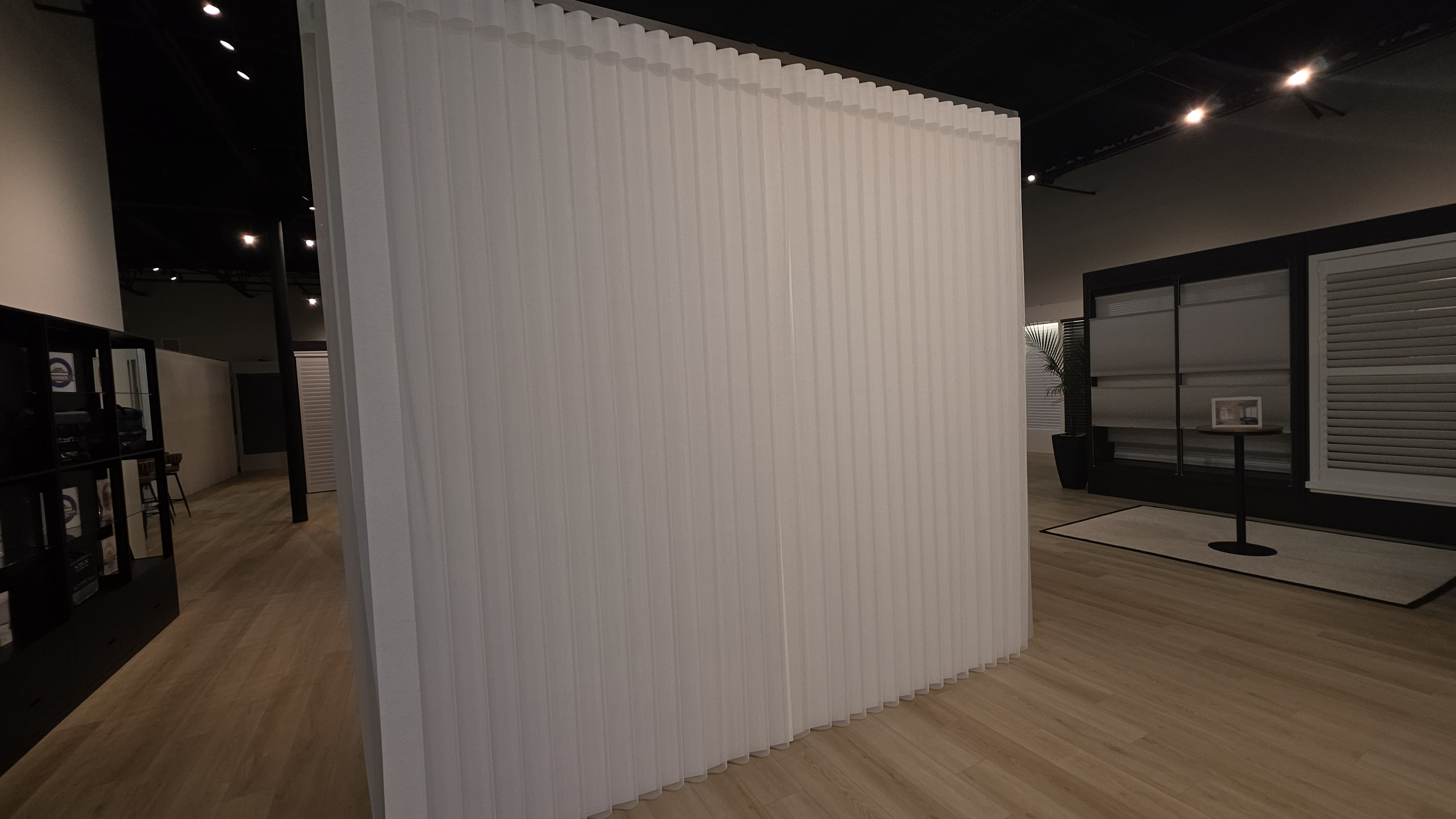 Large vertical Norman window treatment display at Norman USA showroom