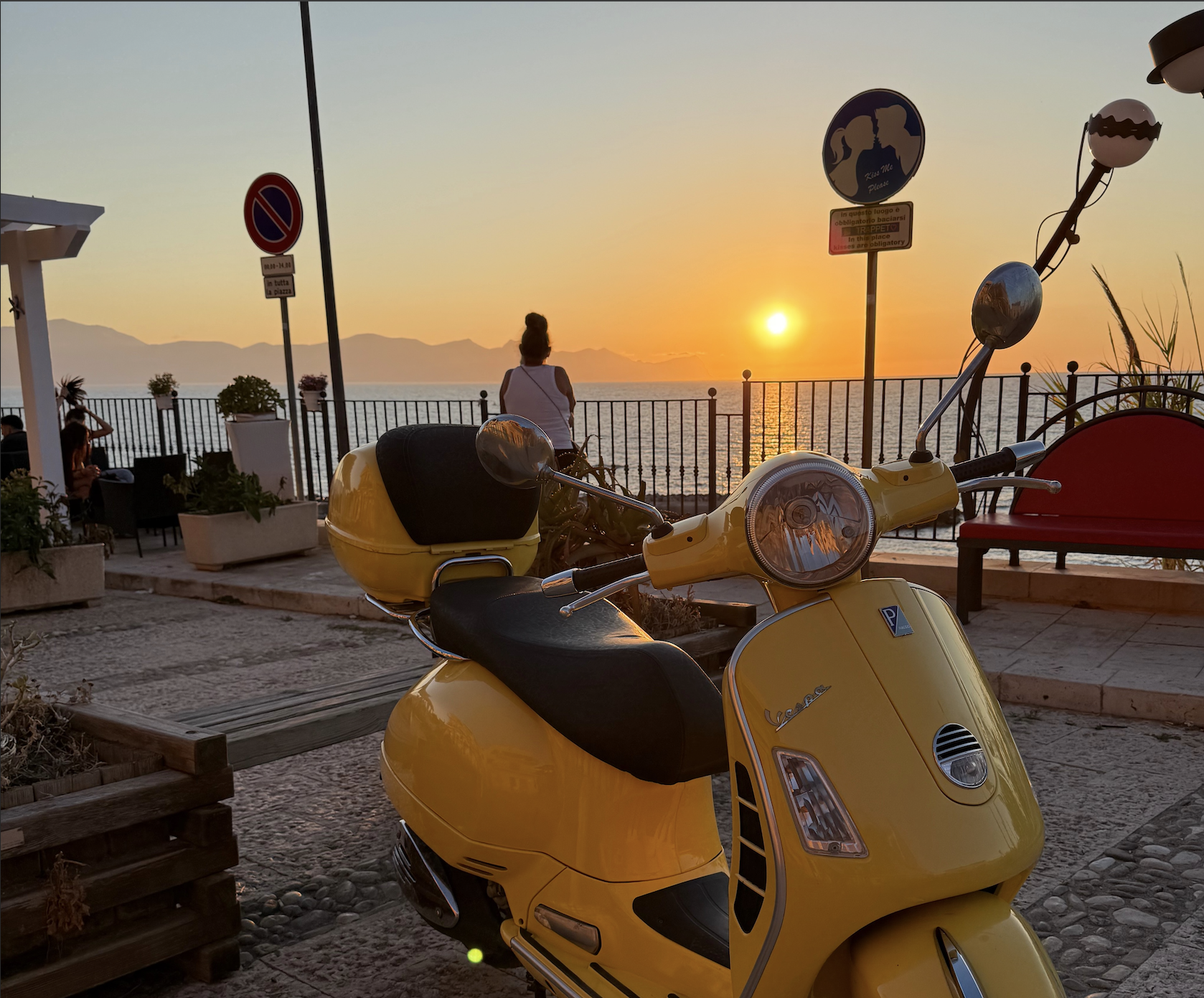 Sicilian Vespa with sunset