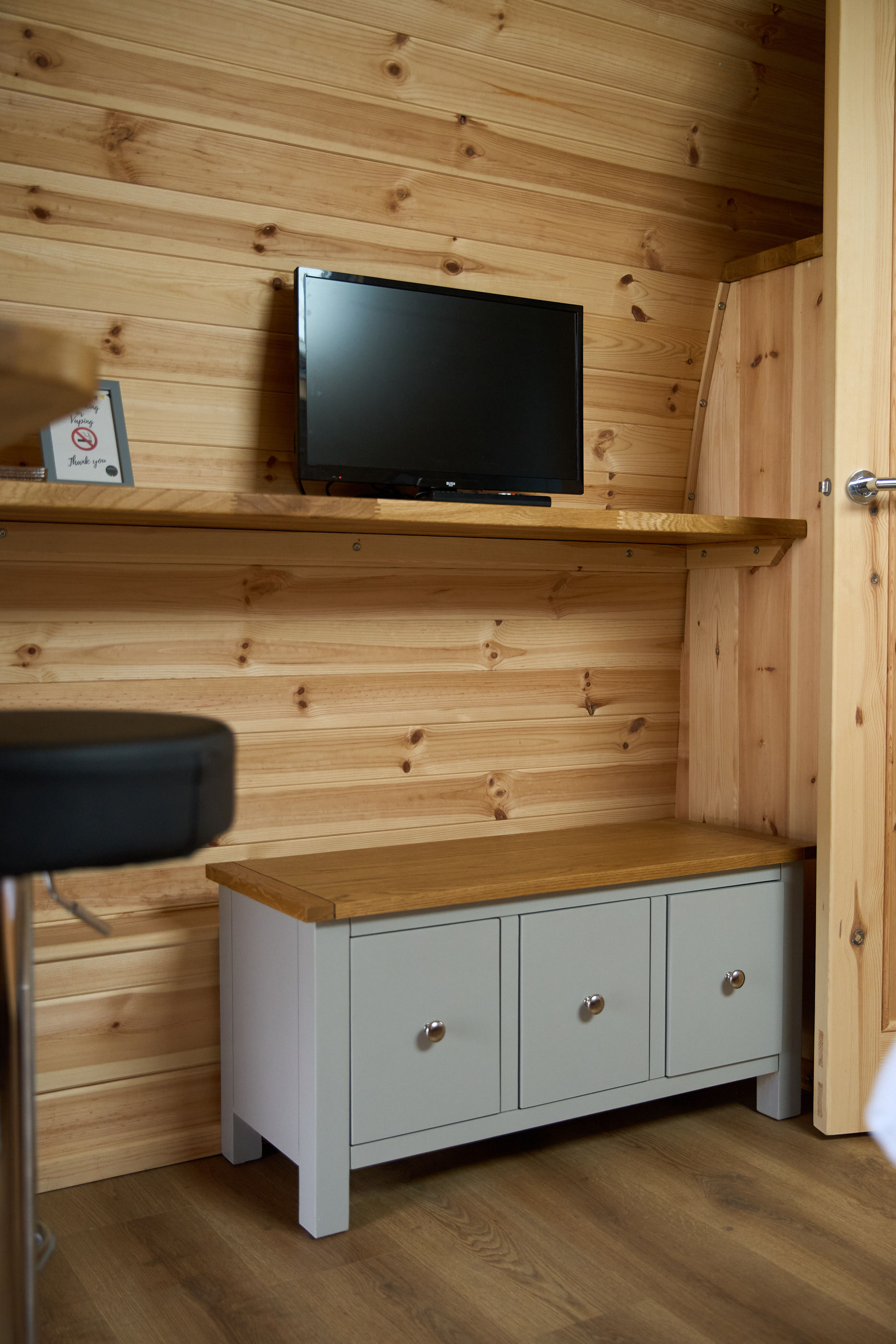 Smart TV and storage cabinet inside the standard luxury pod