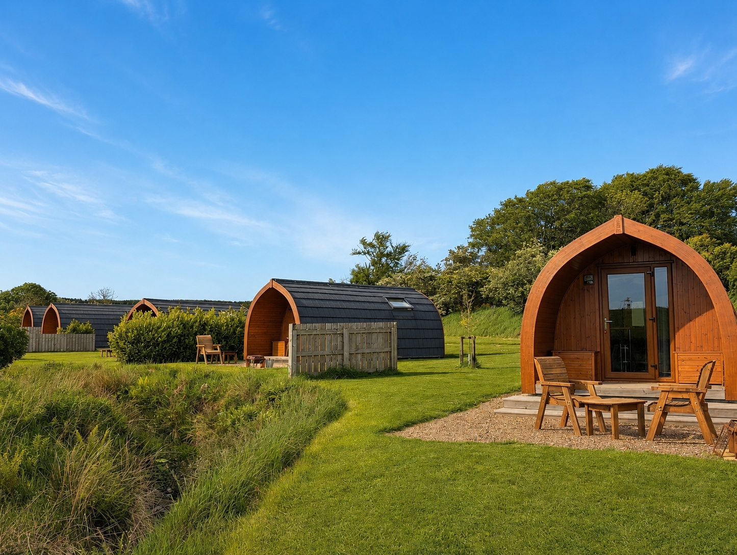 Luxury adult-only glamping pods at Braeview Escapes in the Scottish Borders, featuring comfortable outdoor seating and fire pits.