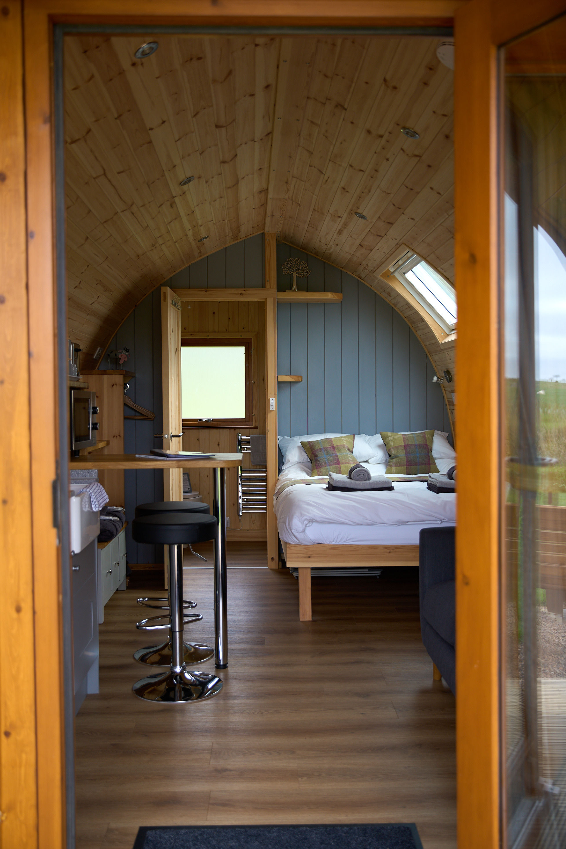 Private hot tub area outside a luxury pod at Braeview Escapes