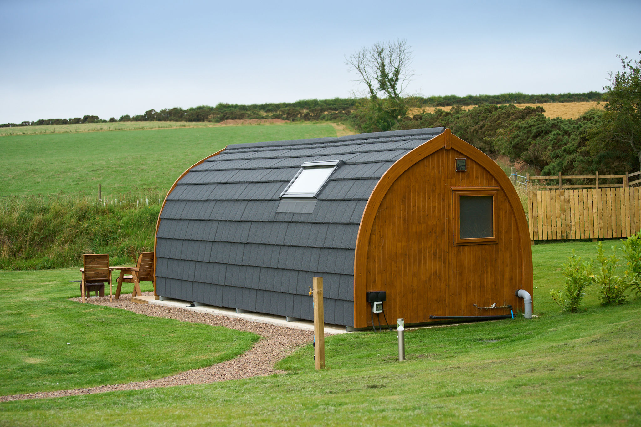 Luxury bedding and thoughtful touches inside a Braeview pod