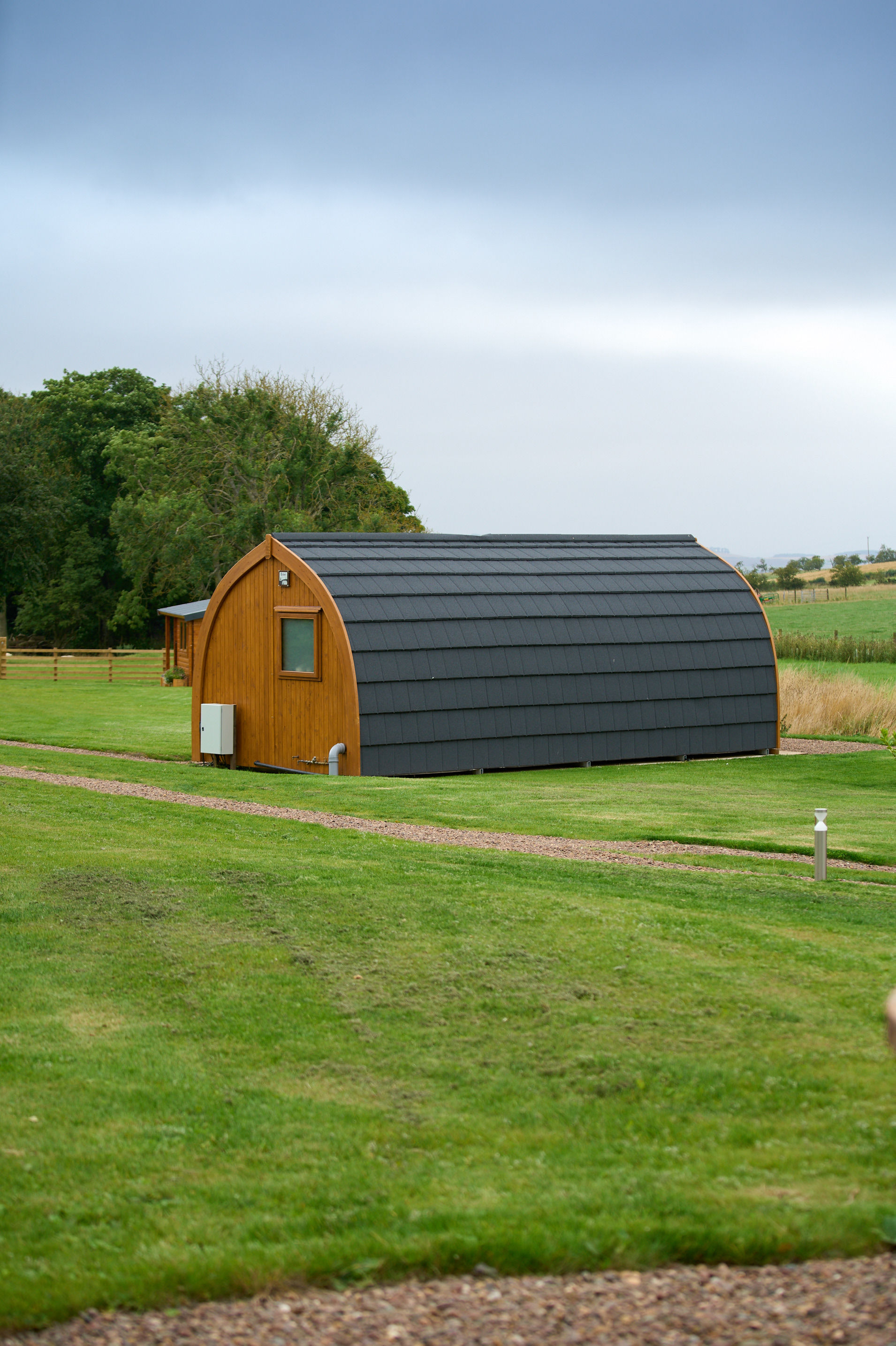 Fully equipped modern kitchen area inside an adult-only glamping pod