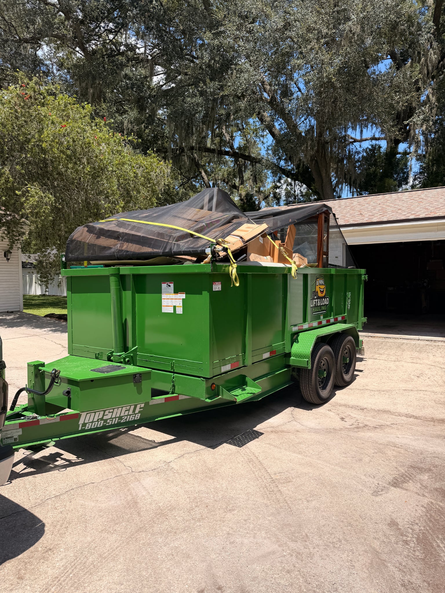 Full dump trailer loaded and tarped for hauling