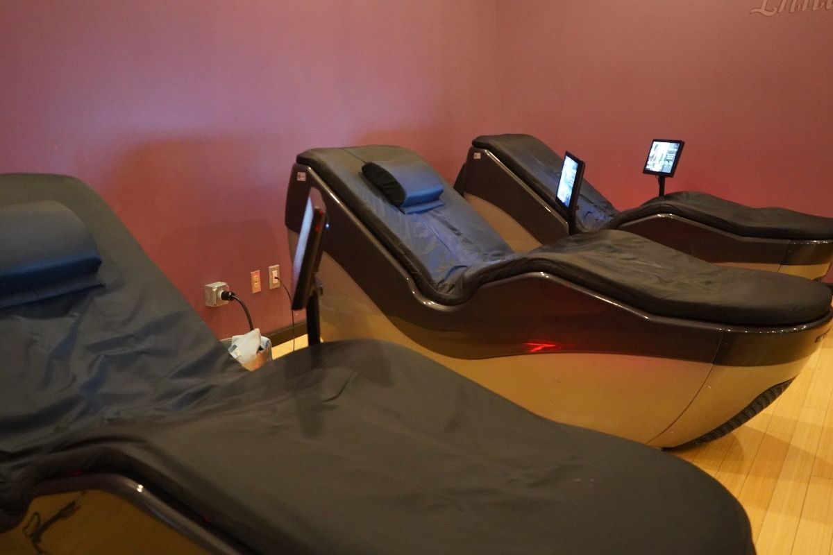 Hydro massage recovery loungers and relaxation amenities at The M.A.C. in Cedar Rapids
