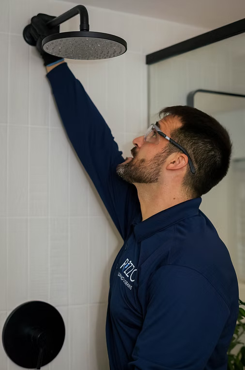 Plumber repairing a fixture