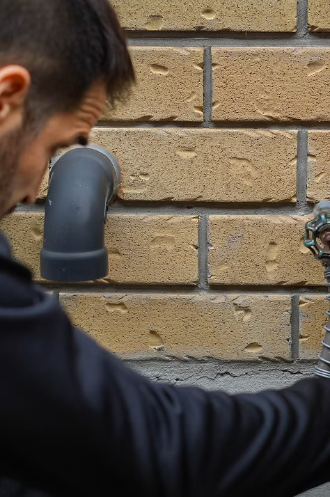 Plumber installing new fixture