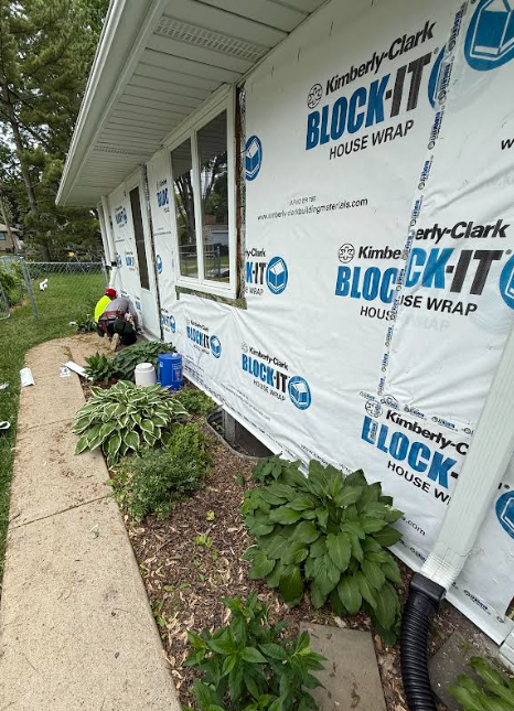 LP SmartSide Siding Installation During - Kimberly-Clark Block-IT house wrap installed - Columbia Heights MN