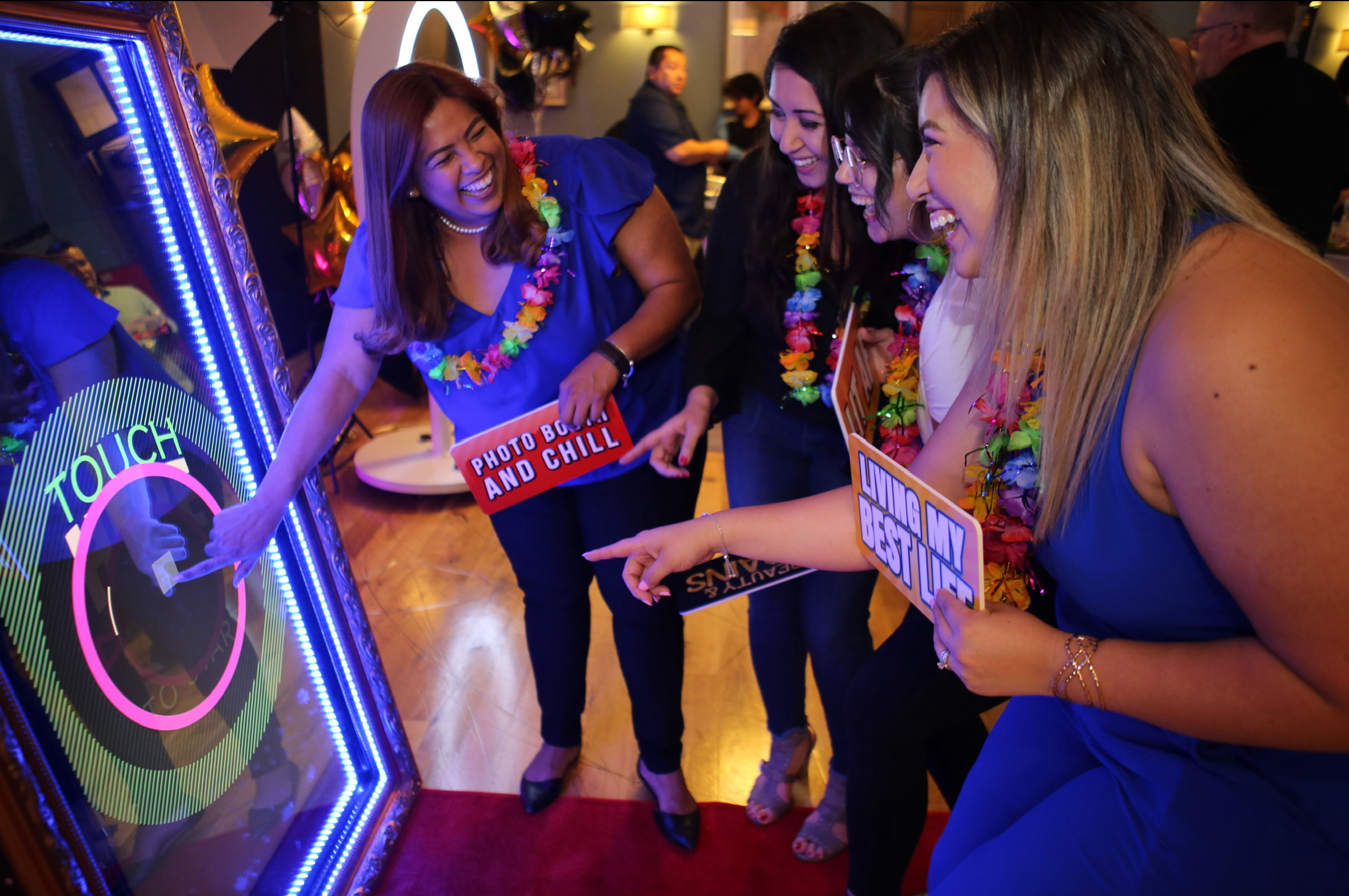 Group of friends at the photo booth