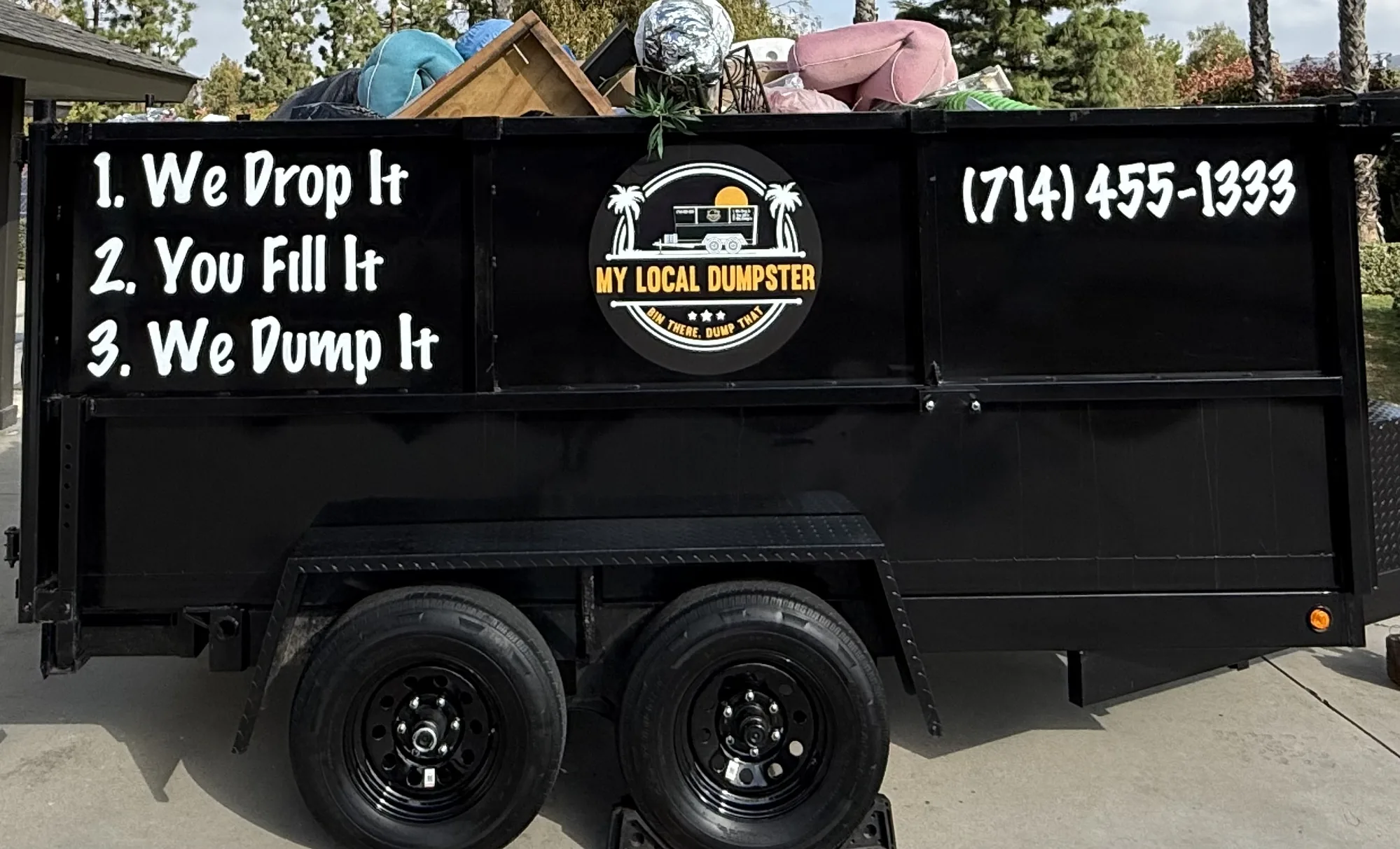 Dumpster filled during a full-house and estate cleanout in North Orange County
